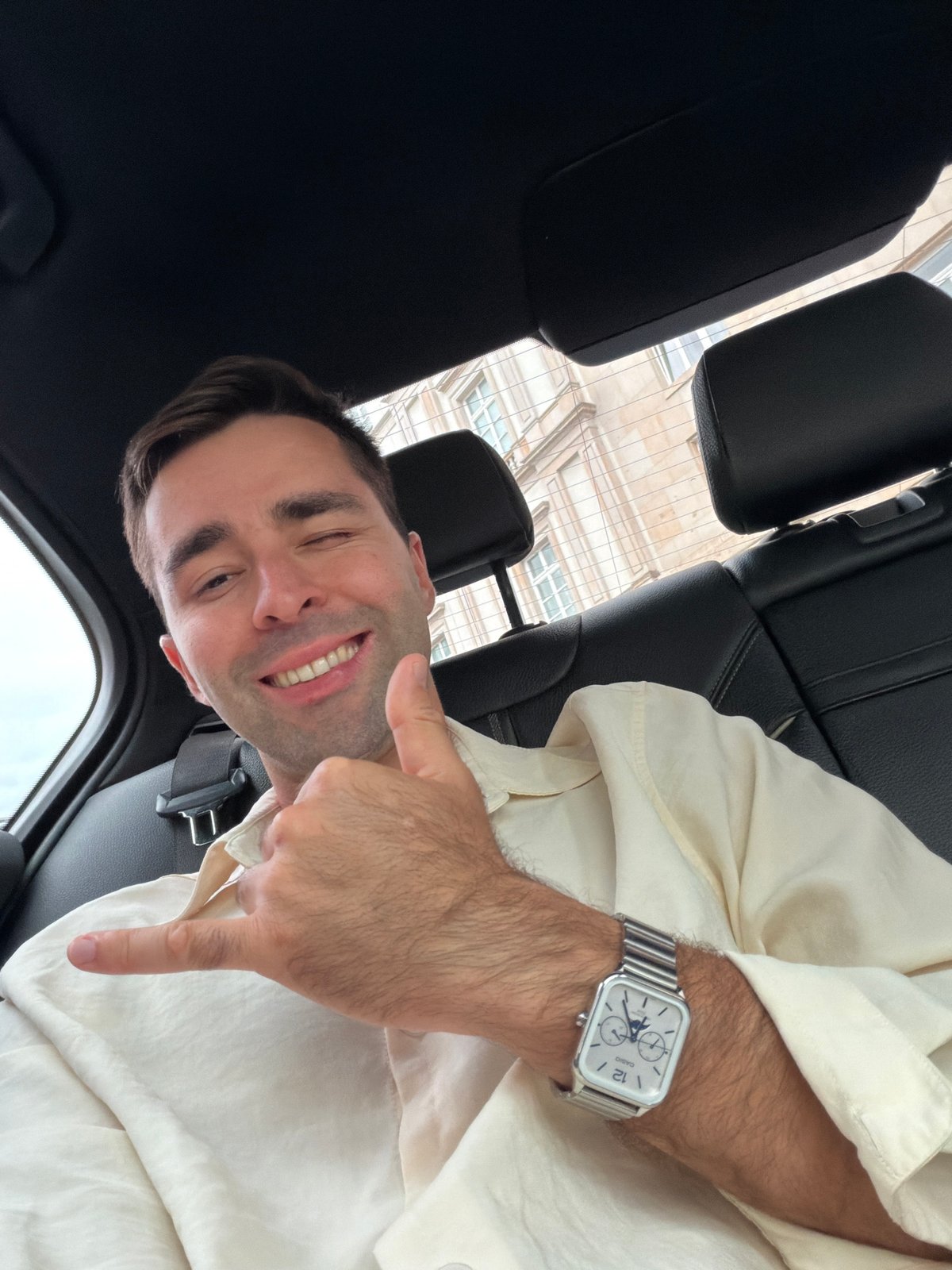 Shaka and a wink from the back seat in Warsaw