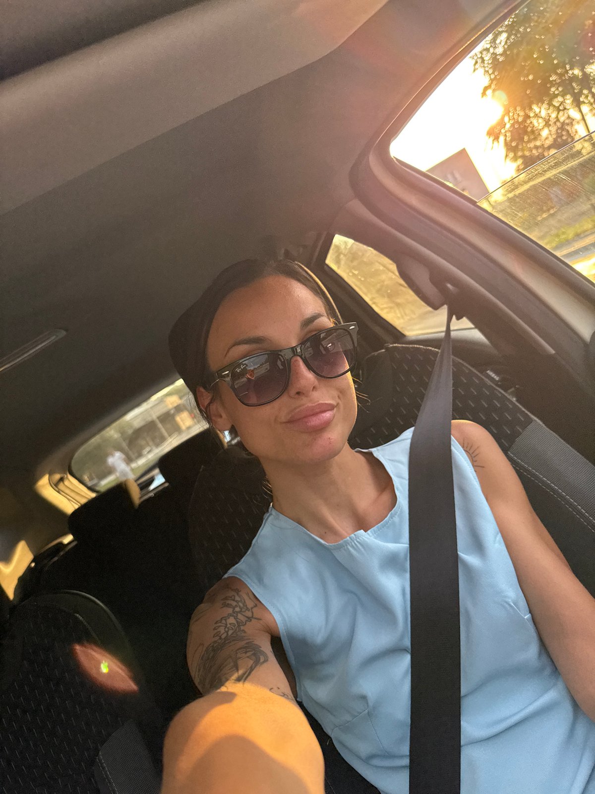 Through Pleven streets in a black car, mid-afternoon