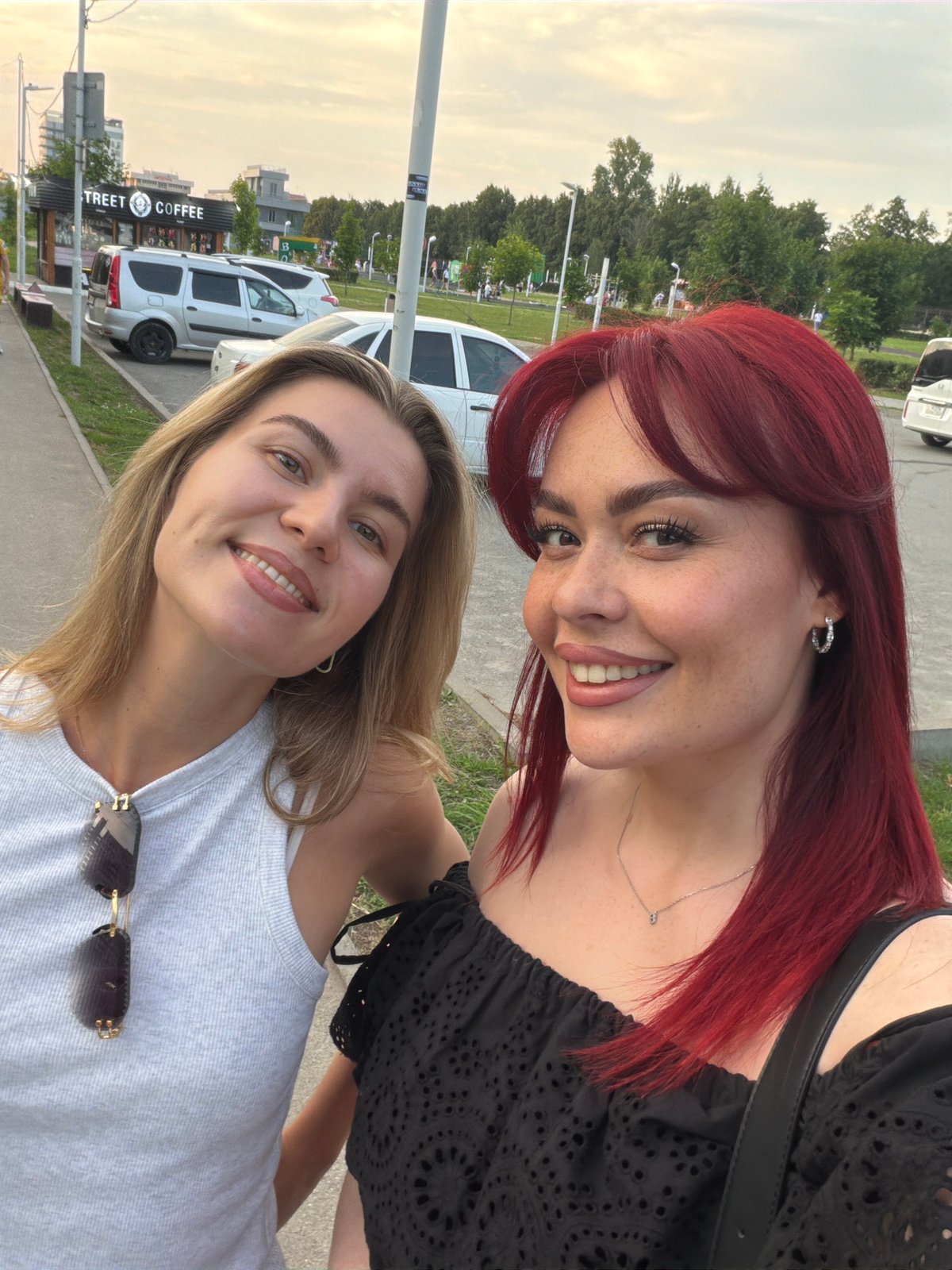 Sidewalk hangout with coffee and selfies in Tolyatti