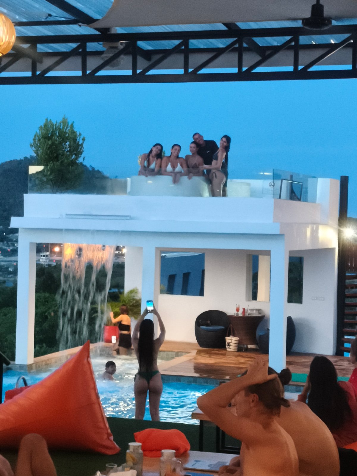 Dusk at a rooftop bar and resort in Ban Bang Rak