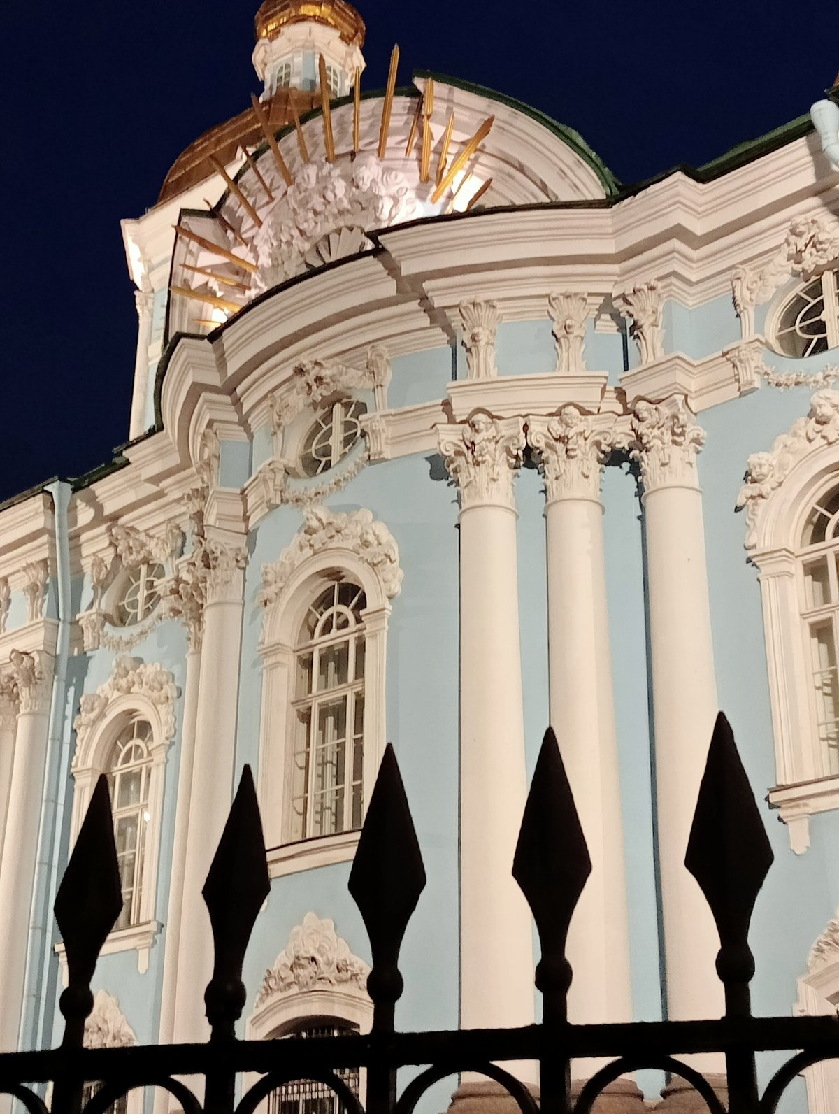 Saint Petersburg's illuminated Baroque cathedrals on a summer night
