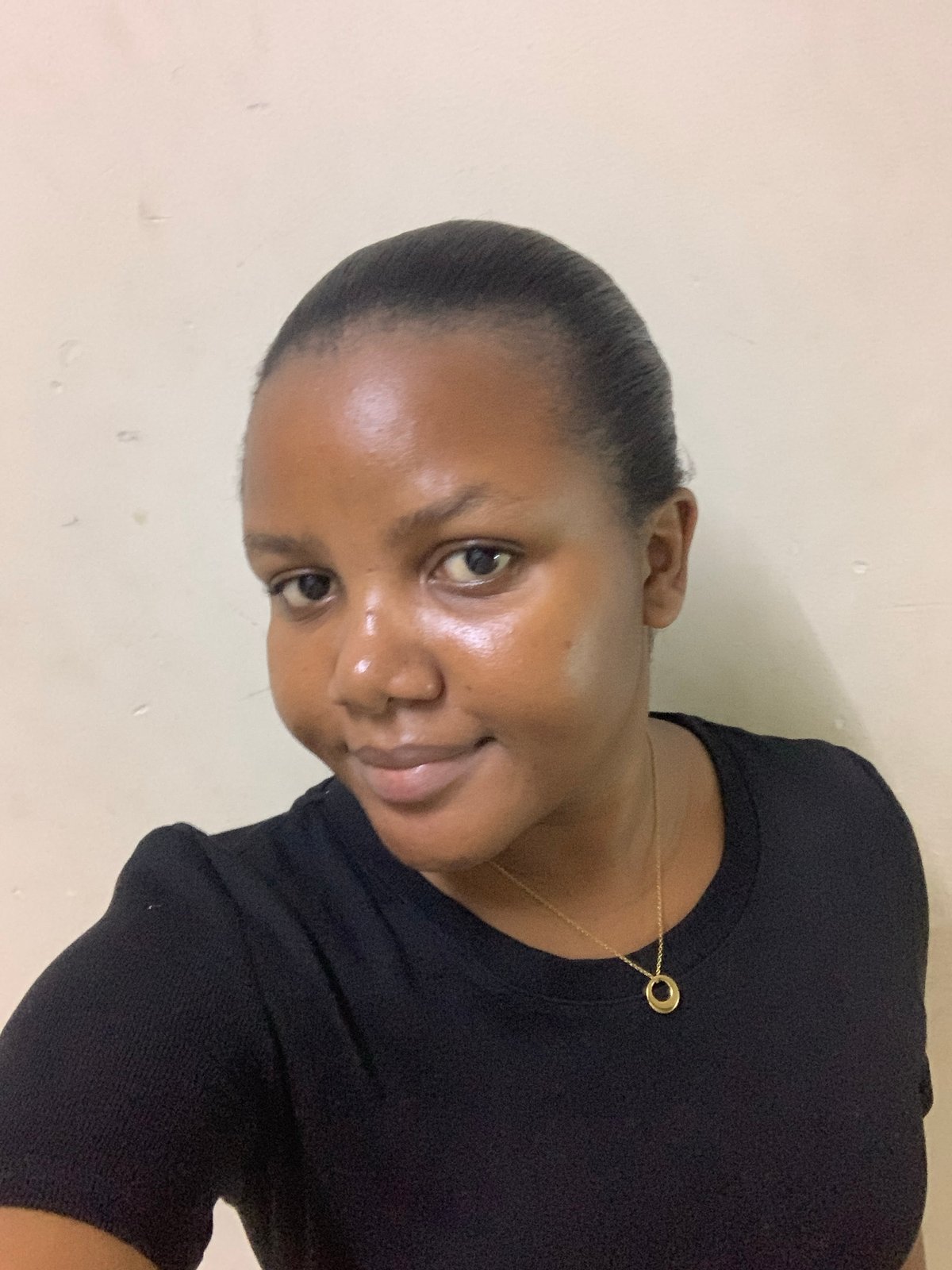 Woman captured in quiet moments at Dar es-Salaam residence