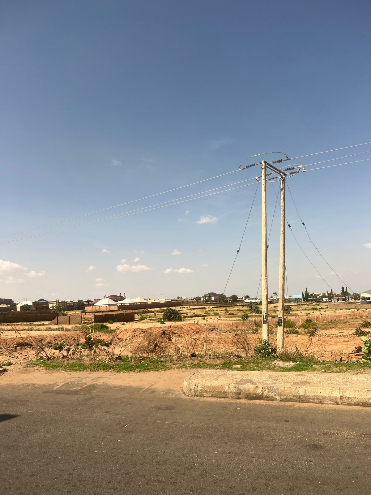 Street scenes captured in Gombe, Nigeria on clear afternoon