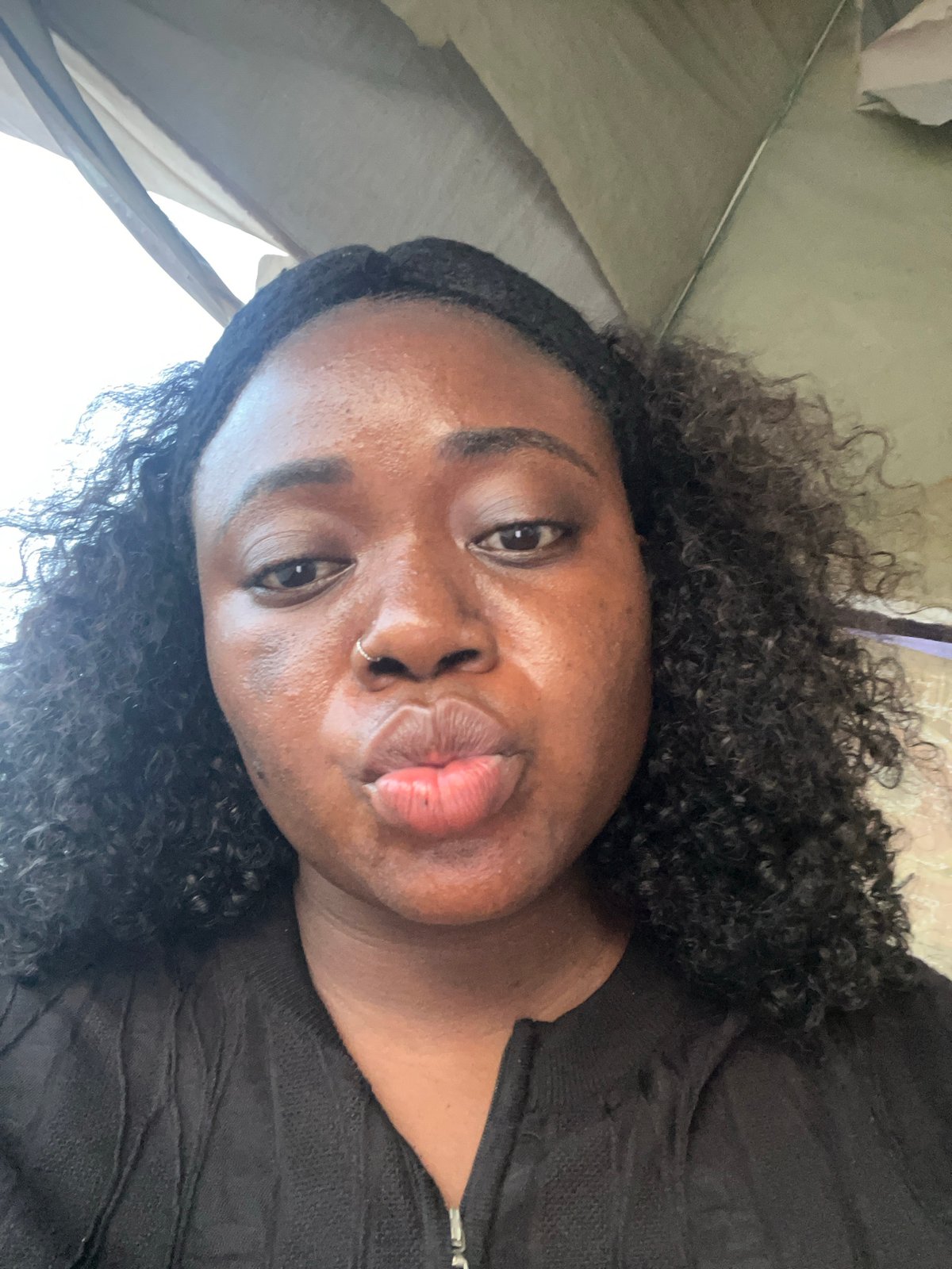 Daily life unfolds across Abuja streets and neighborhoods