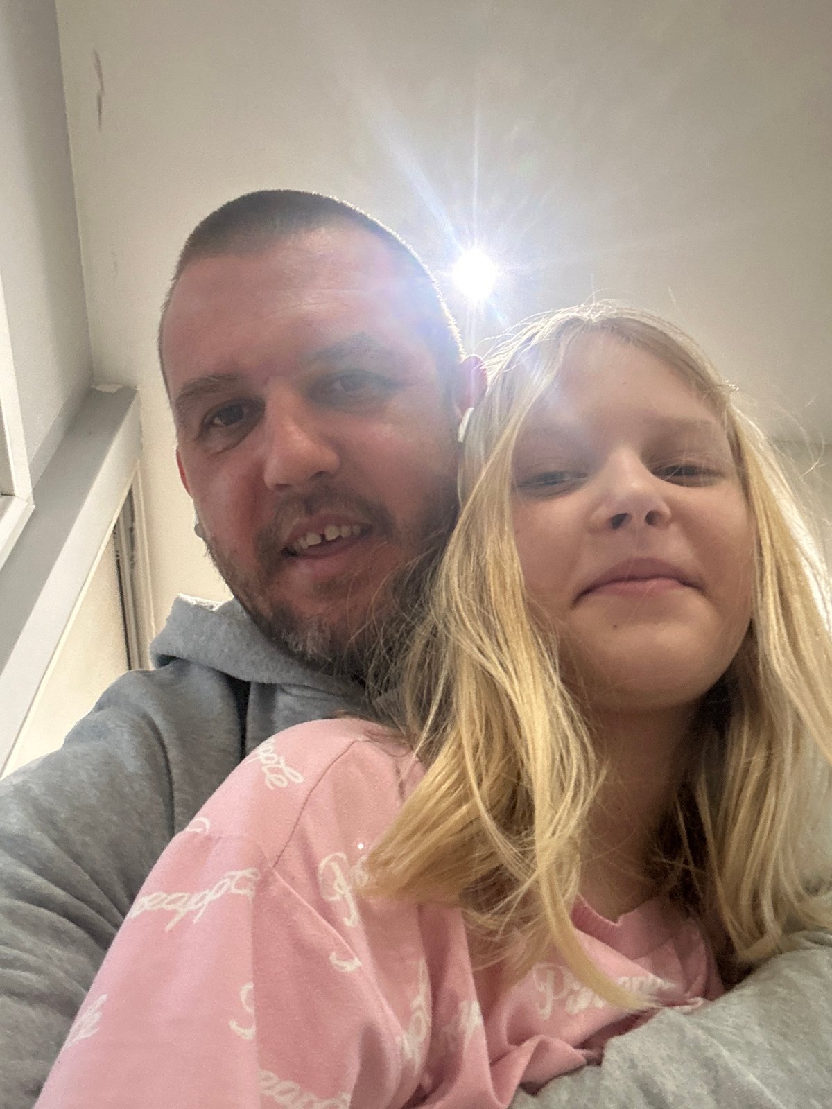 Father and daughter take selfies together in Sofia