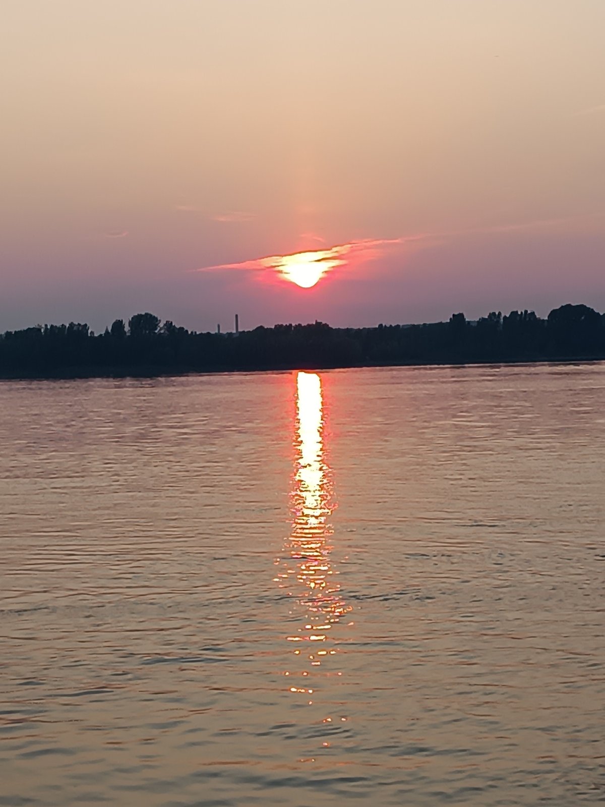 Kama River sunset, Chaikovsky — two angles, one moment