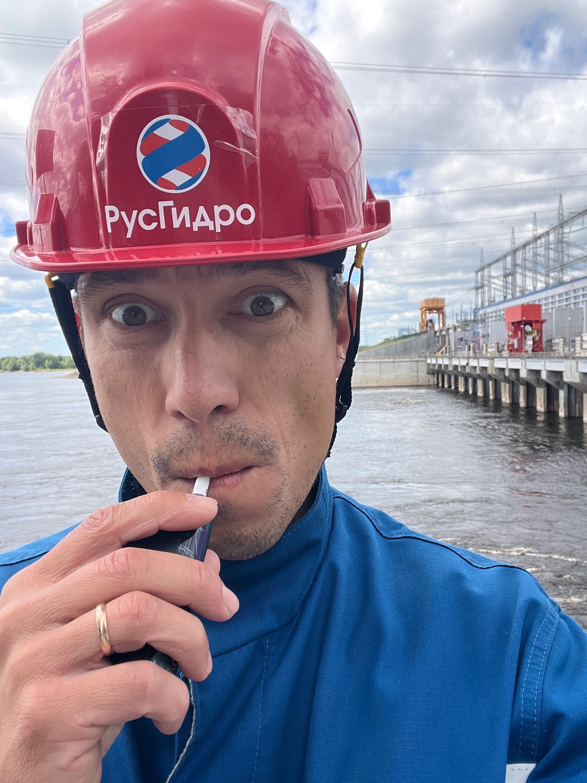 Workers document Votkinsk hydroelectric facility in Chaikovsky, Russia