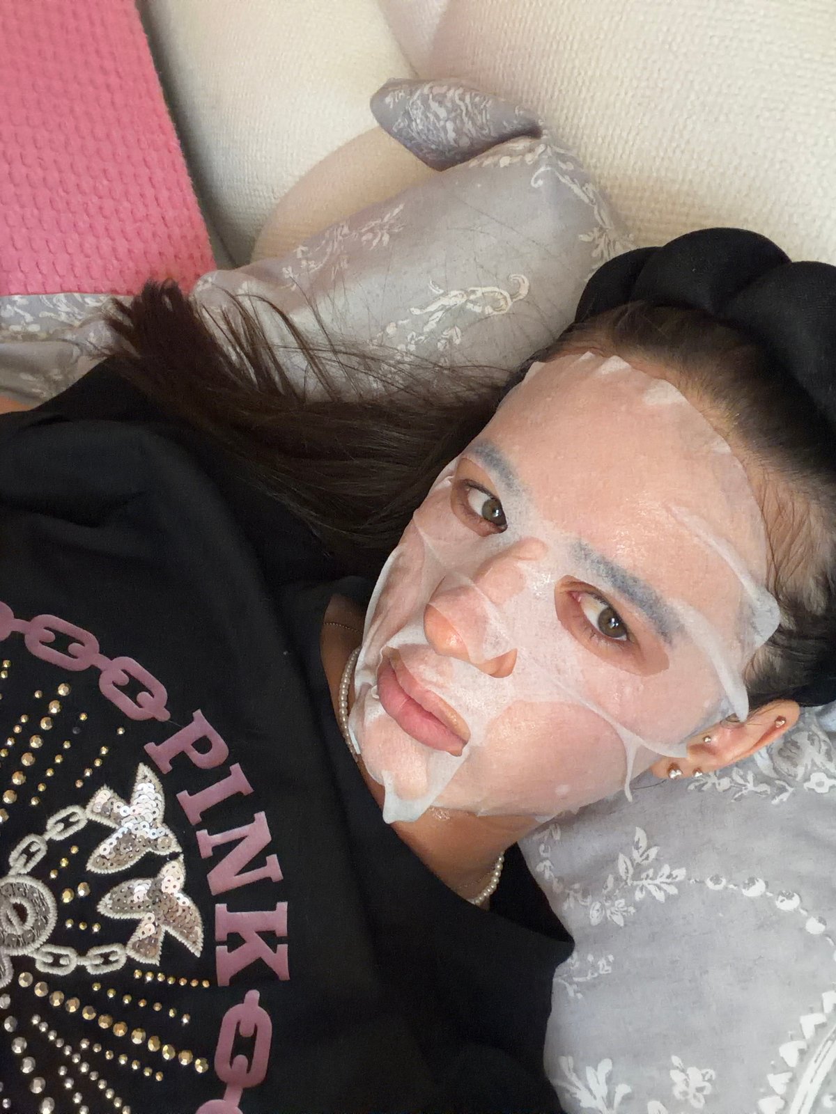 Sheet mask day at home with a cat and a laptop