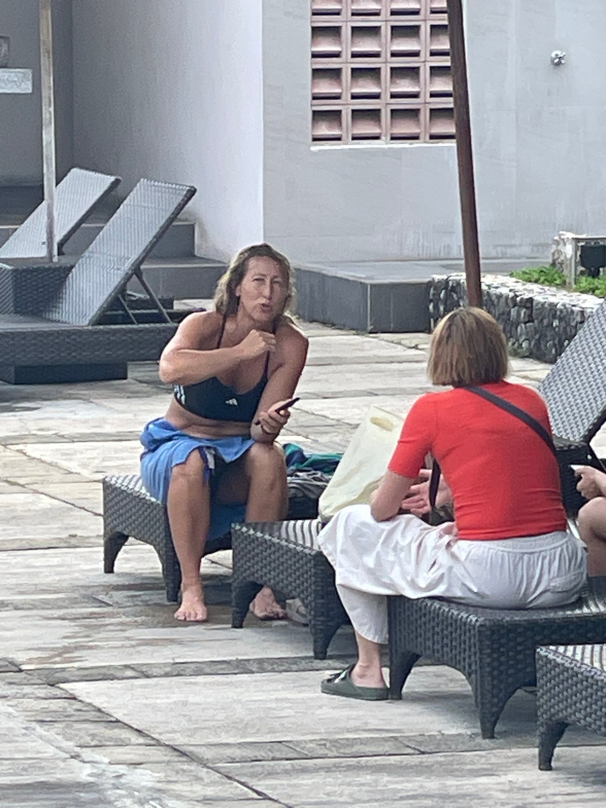 Resort guests enjoy poolside activities in Kuta Selatan, Indonesia