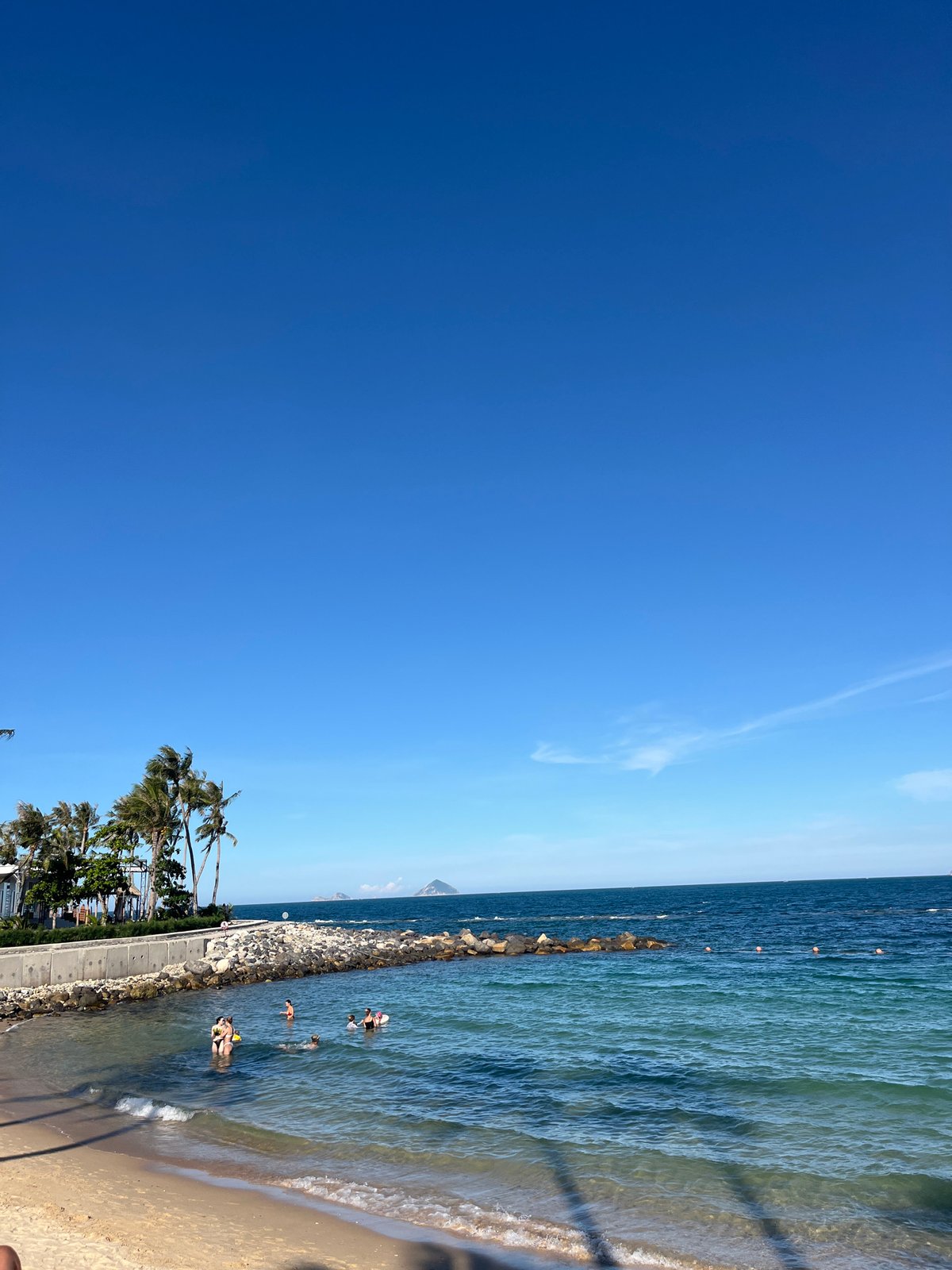 Morning beach day at Nha Trang's shore, swimming and playing