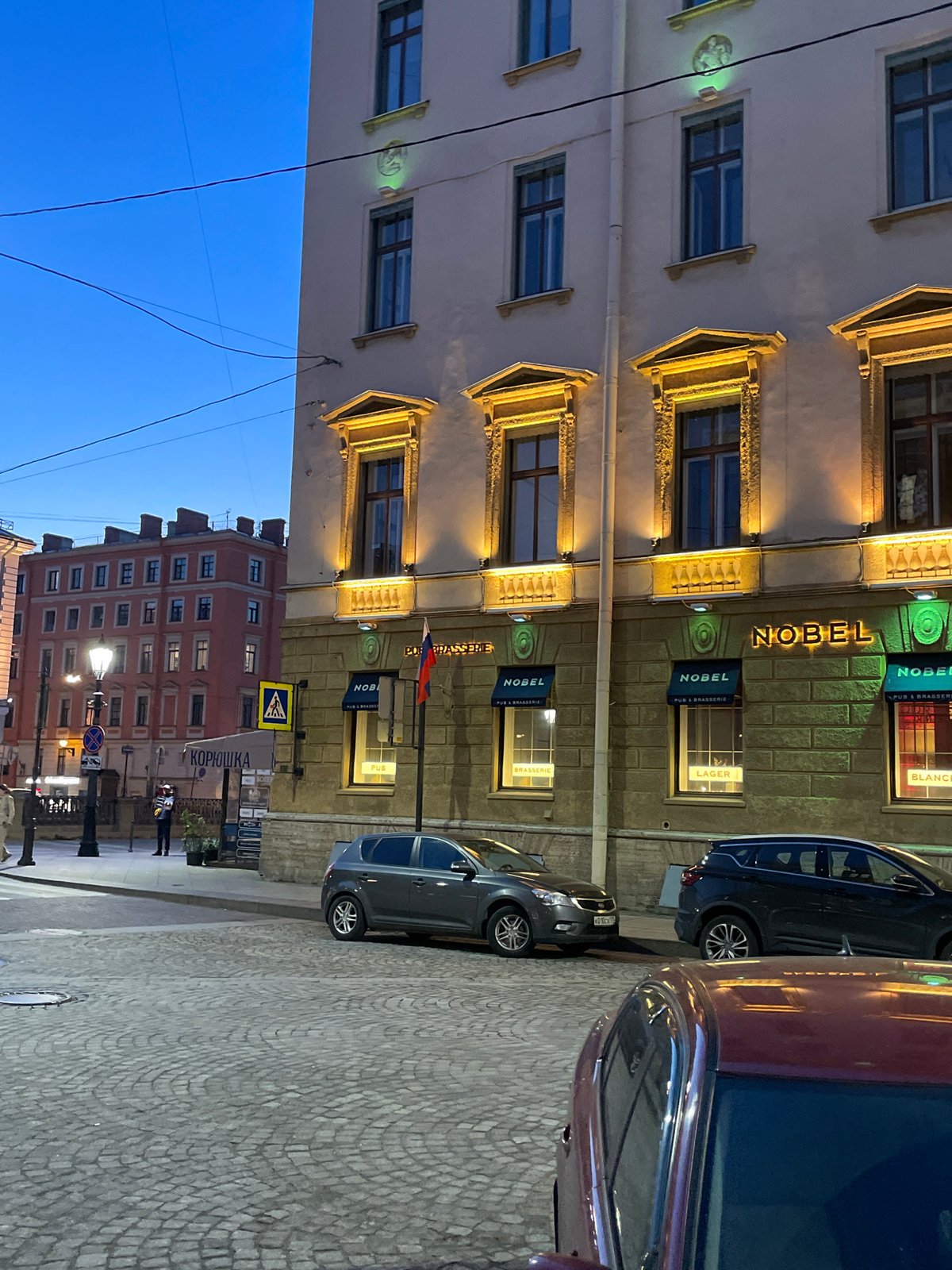 Evening street scenes documented in Saint Petersburg during twilight hours