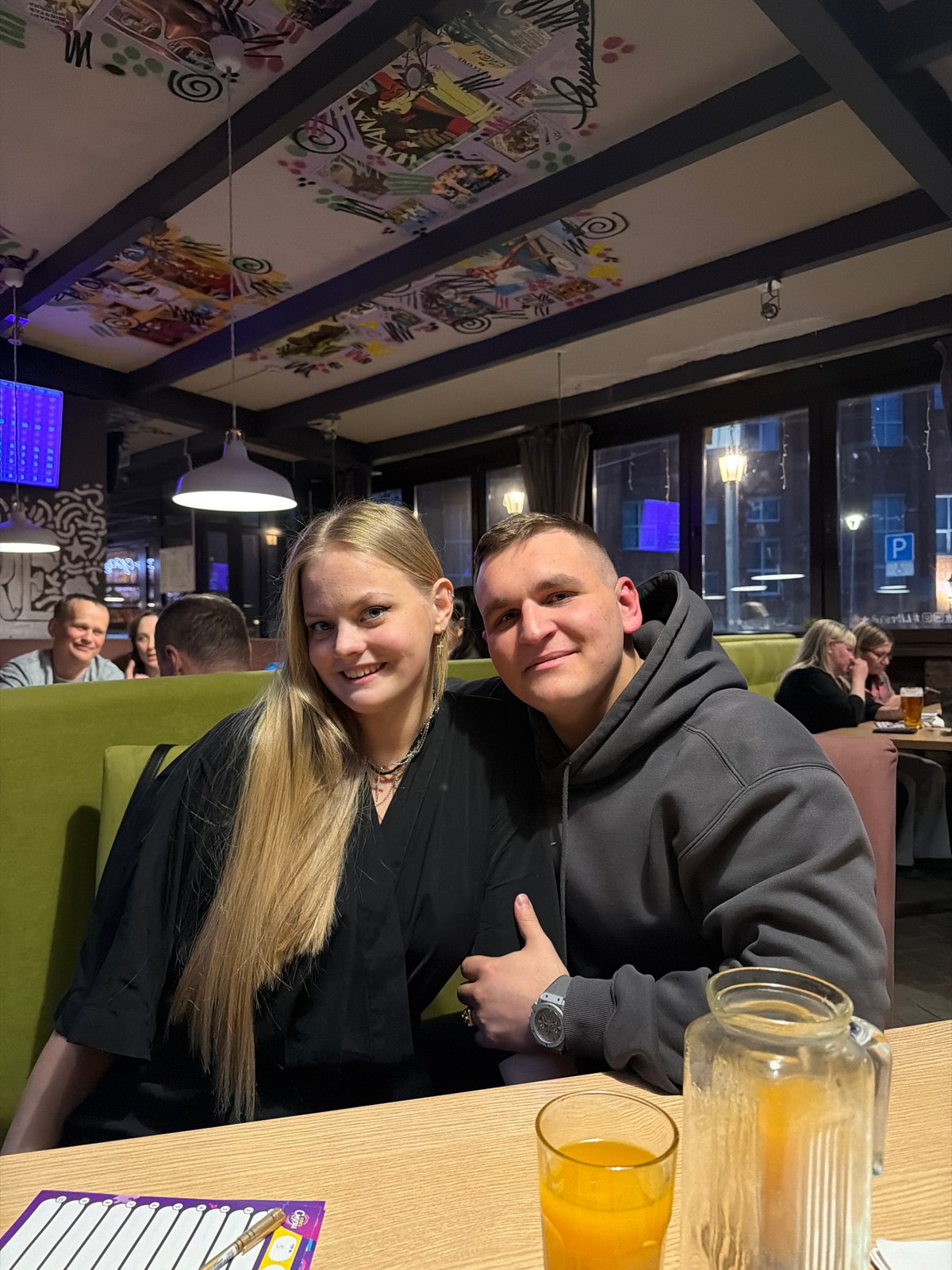 Young couple shares meal at Izhevsk restaurant