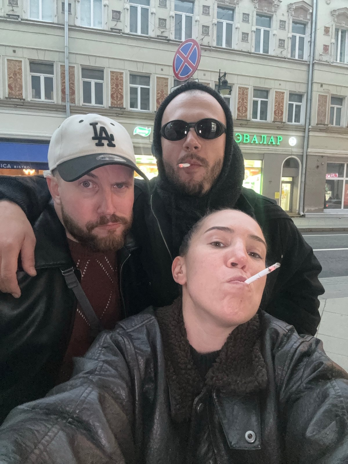Three people take selfie on Moscow street