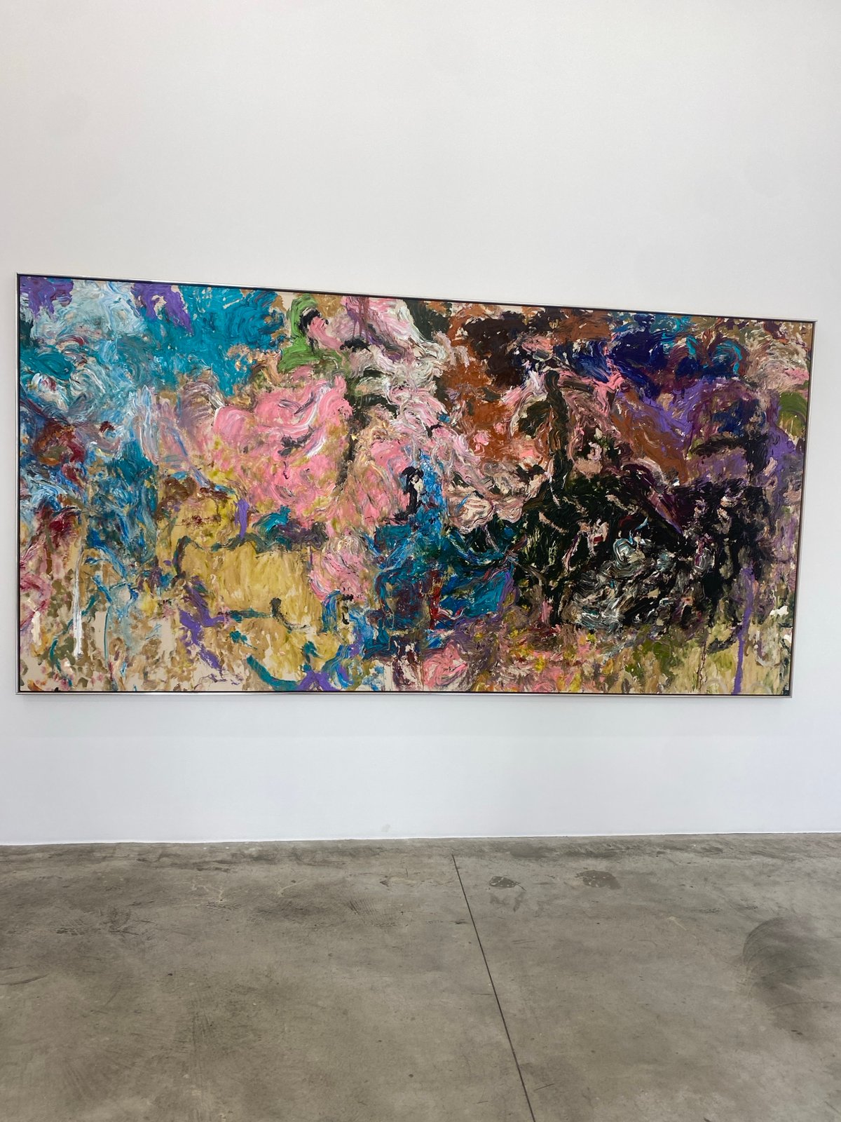 Paris gallery visitors document art viewing experience Friday morning