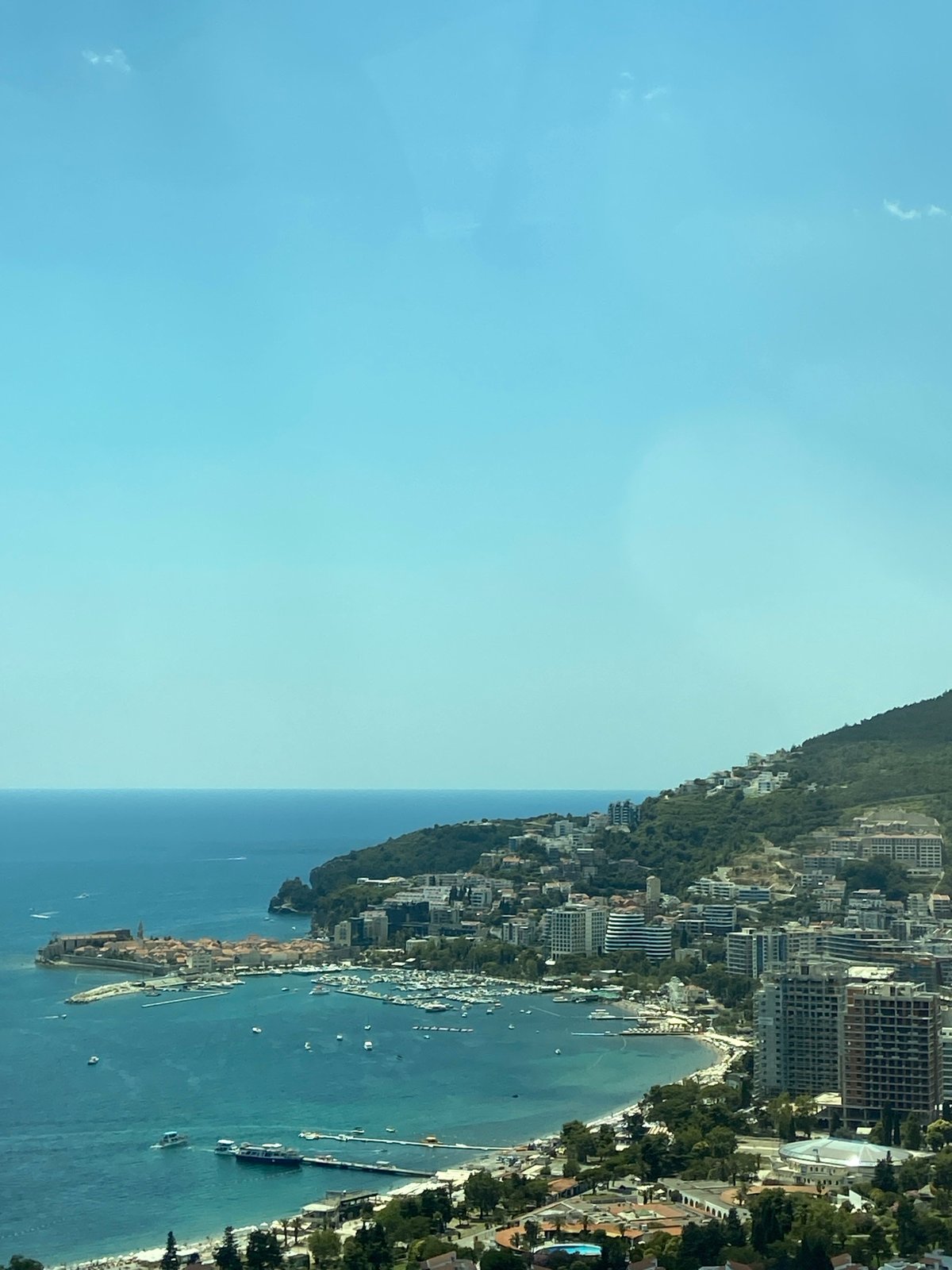 Budva's beaches, boats, and waterfront in full summer swing