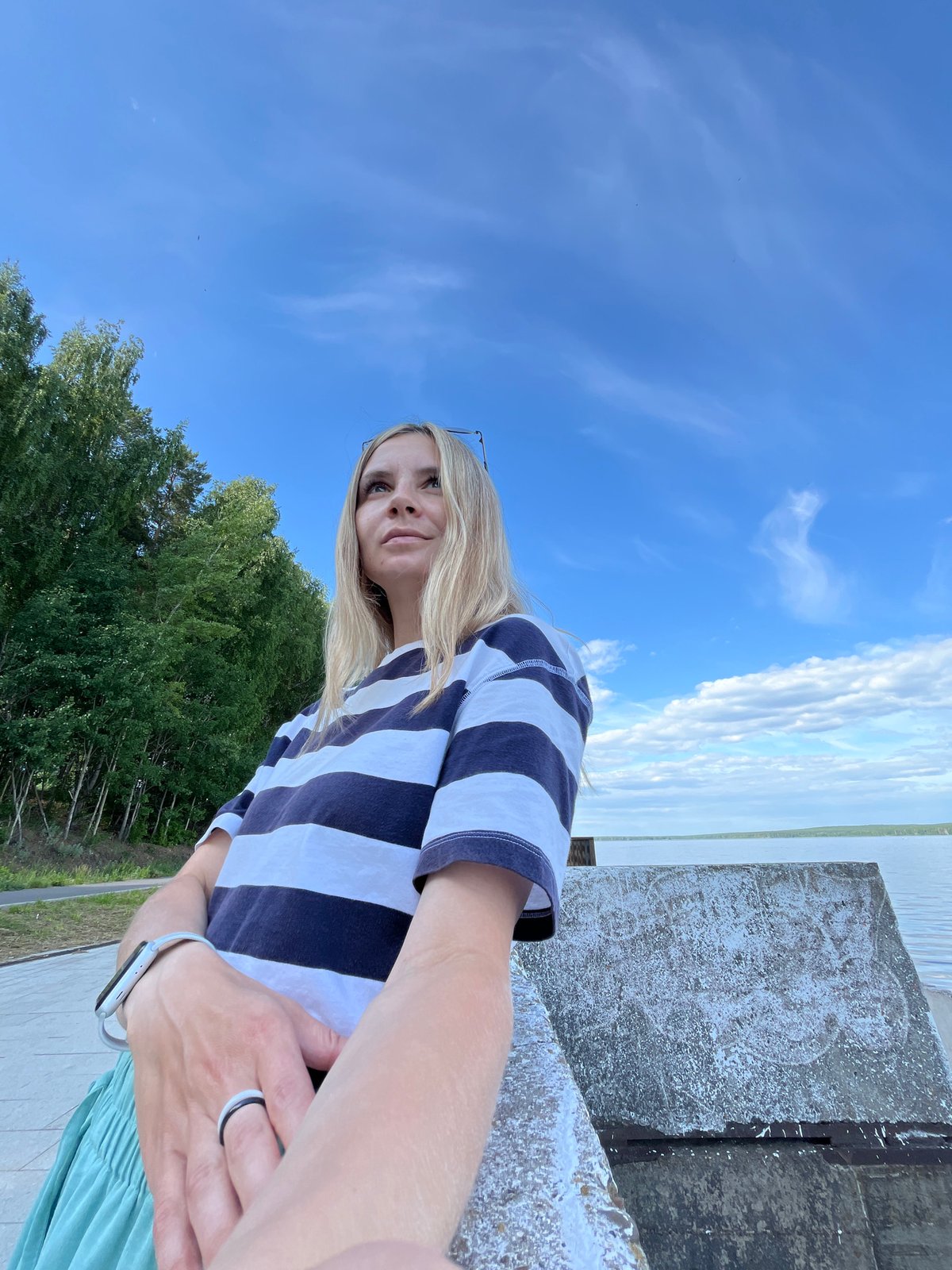 Summer day leisure activities captured along Chaikovsky waterfront embankment