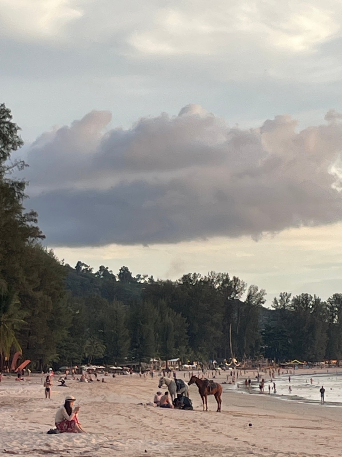 Overcast beach day documented with Harley motorcycle in Choeng Thale