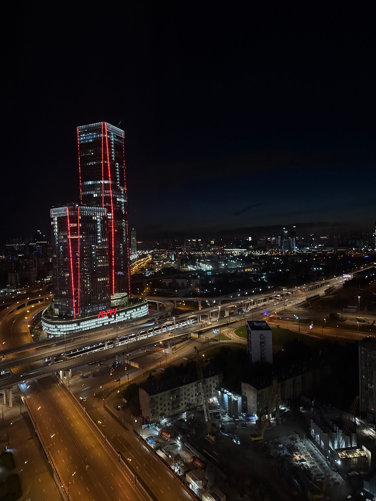 Late-night Khimki: scooter rides, city skylines, and a sleepy Pomeranian