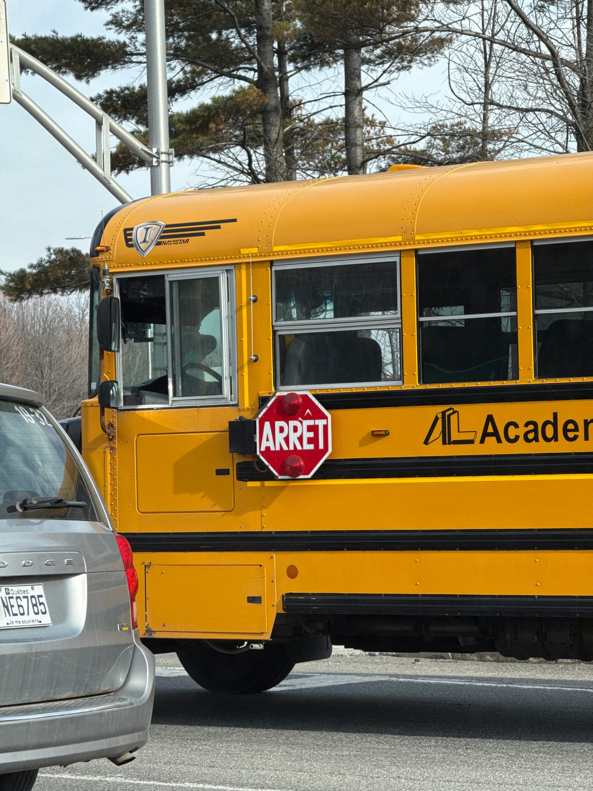 School bus stop sign activated in Blainville evening