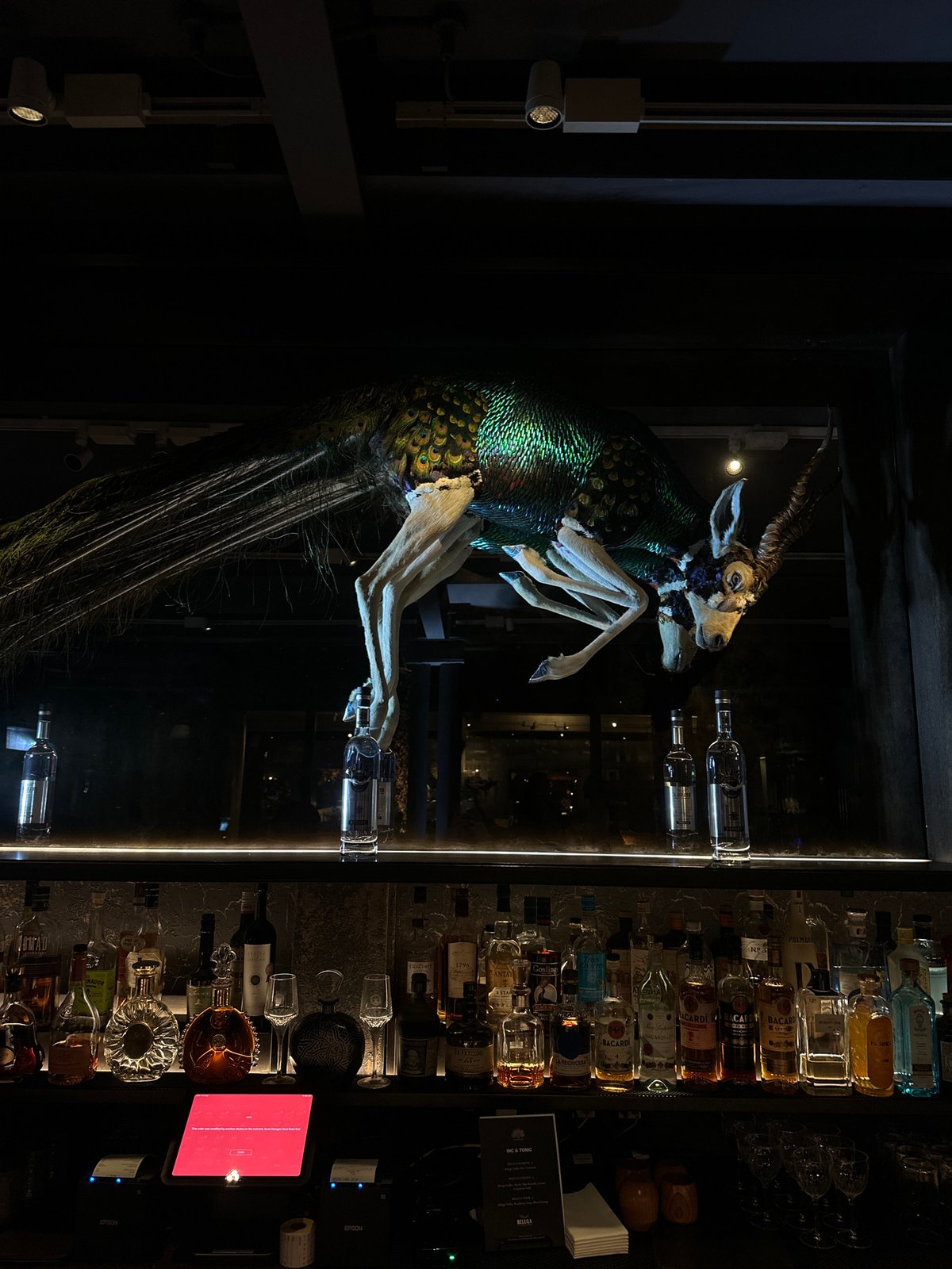 Evening cocktail service captured at London's atmospheric Mandrake bar