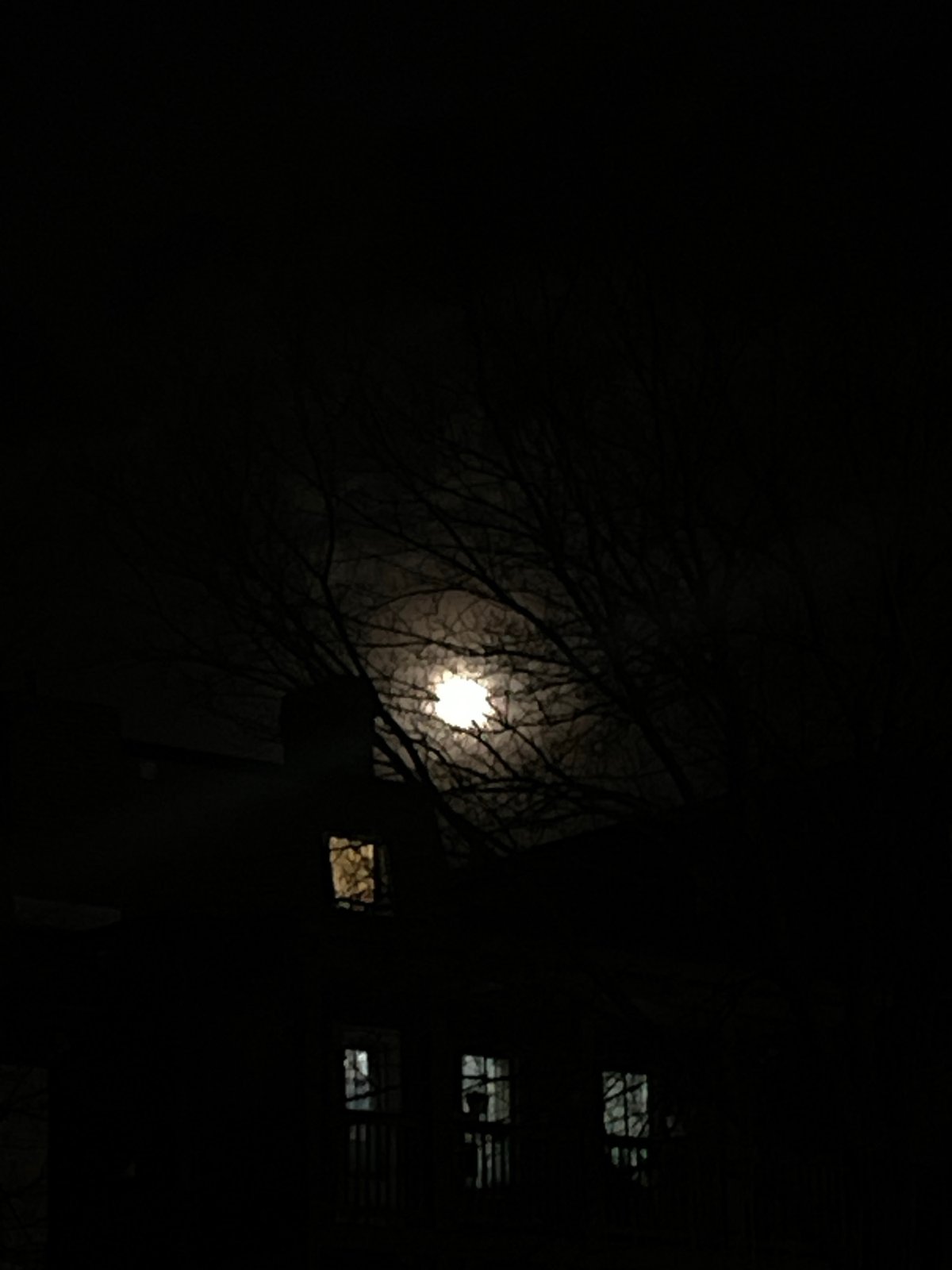 Full moon illuminates quiet Newburgh streets before dawn