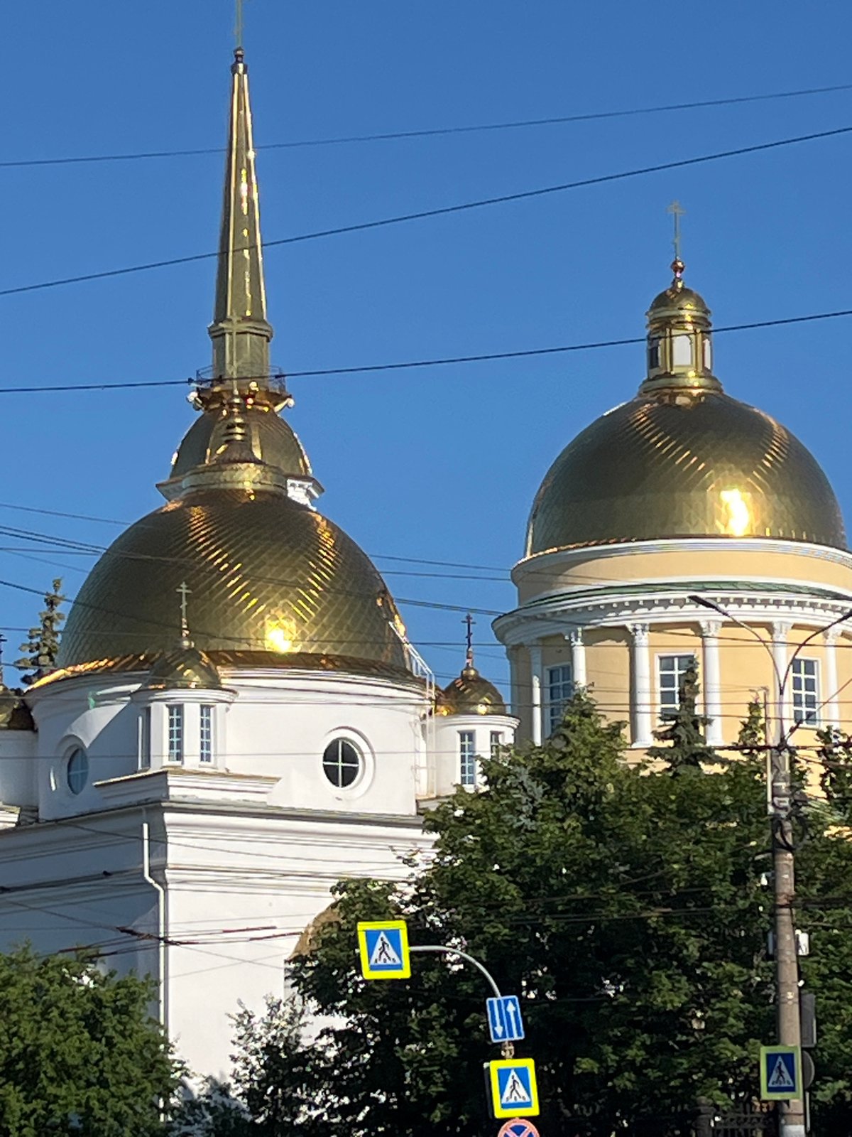 Clear summer day documented across central Izhevsk landmarks and streets