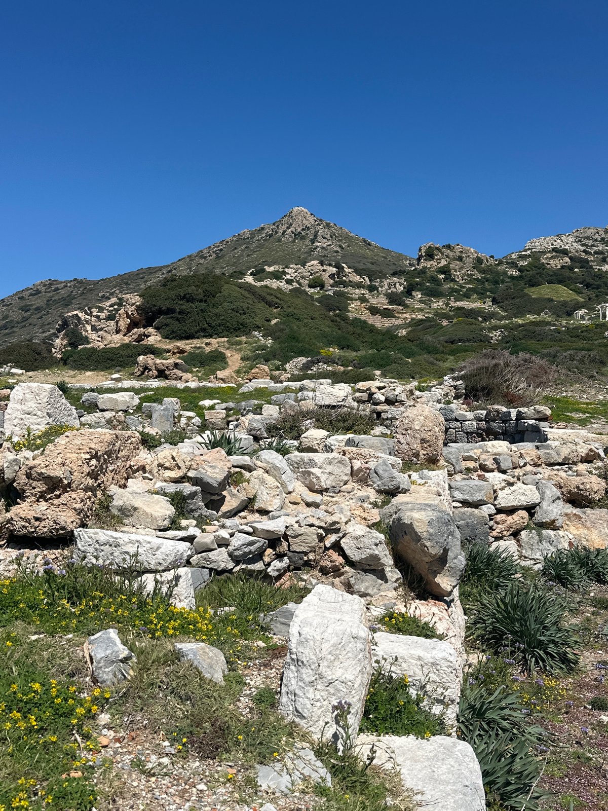 Visitor documents ancient Knidos ruins and Datça coastline