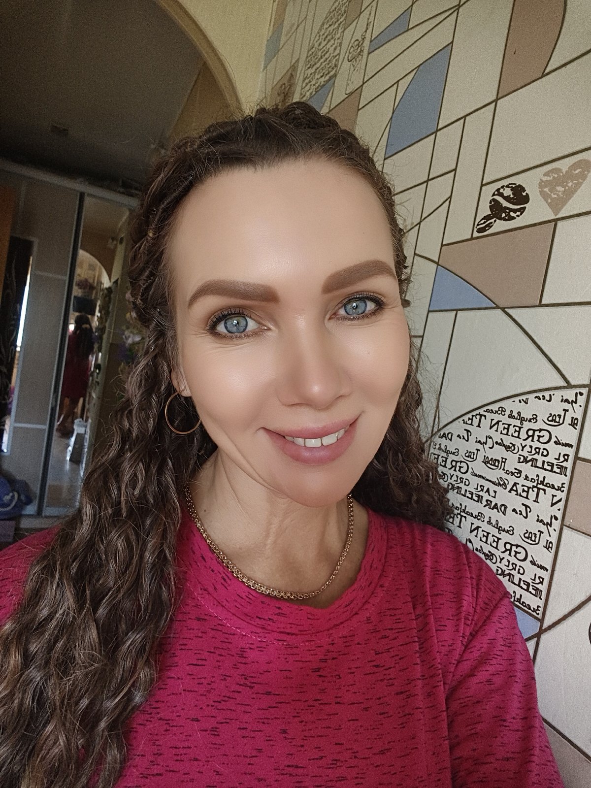 Woman with braided brown hair photographed in close-up portrait