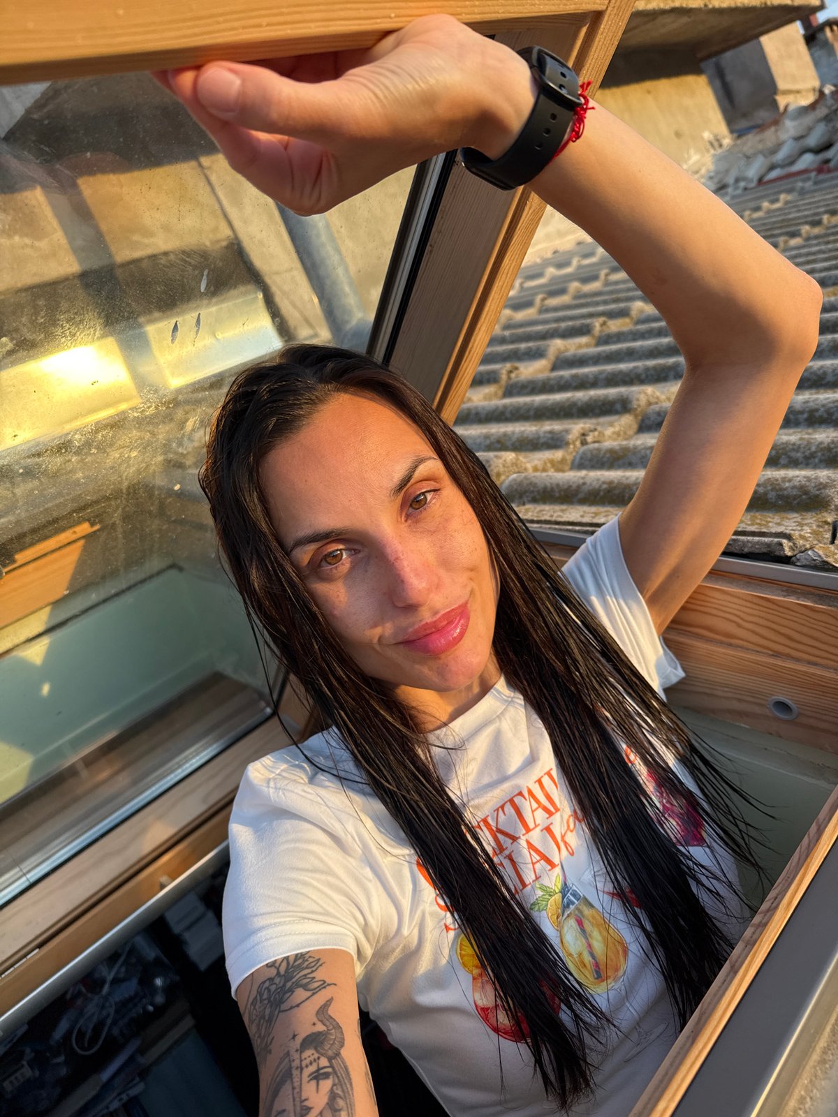 Woman photographed in portrait session near skylight in Pleven