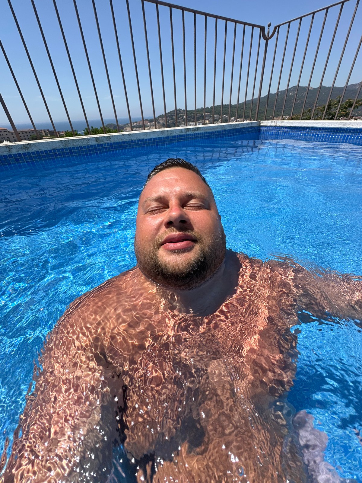 Sunny rooftop pool session in Sant Feliu de Guíxols