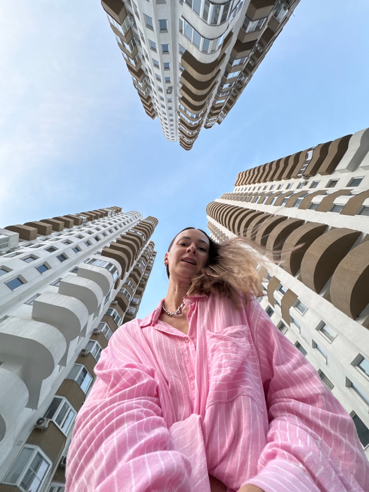 Photo session in Sochi apartment district during golden hour