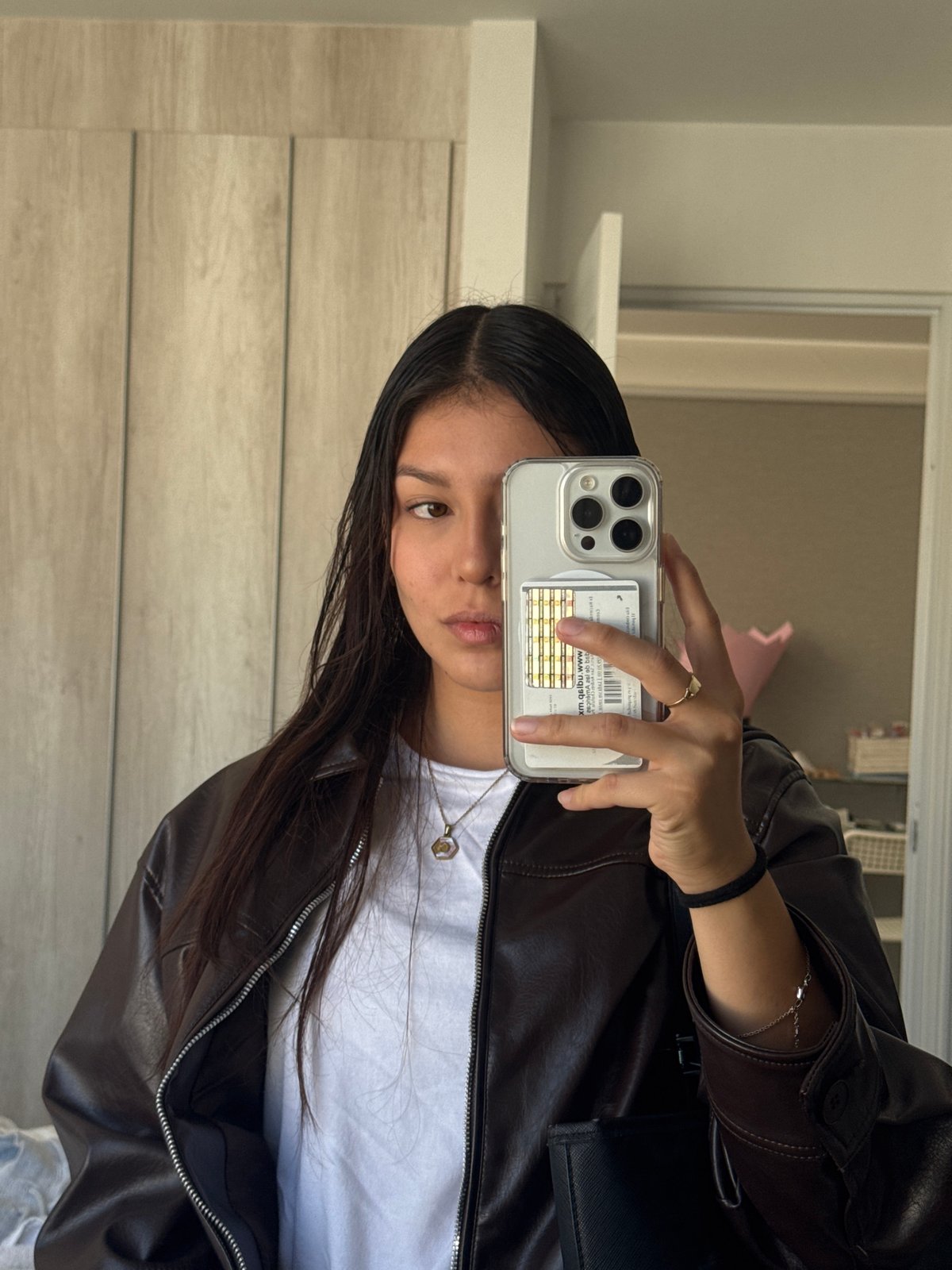 Woman takes mirror selfies in San Francisco Ocotlán, Mexico