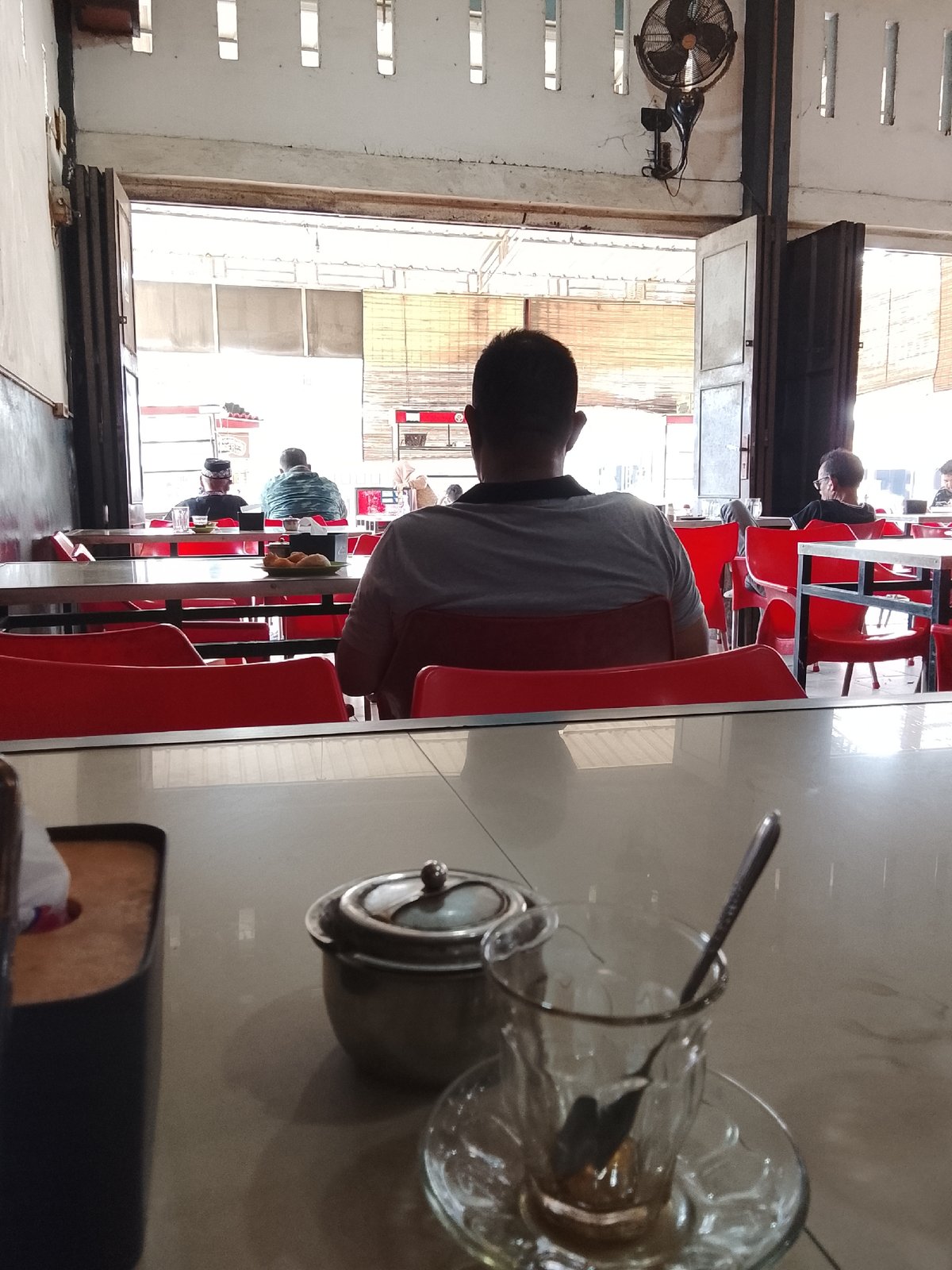 Morning cafe scene captured in Lhokseumawe, Indonesia