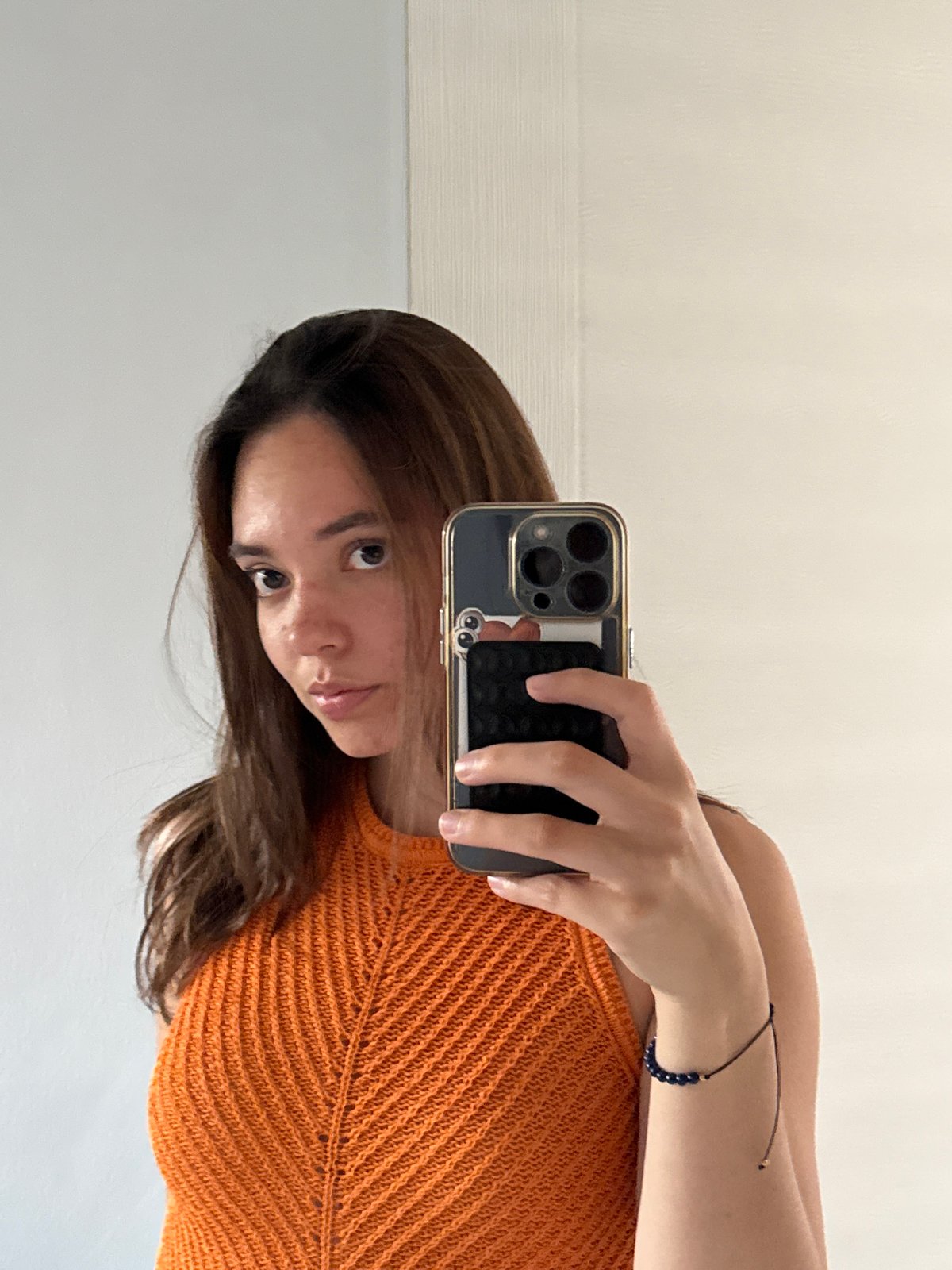 Woman takes indoor selfie in San Bernardino Tlaxcalancingo