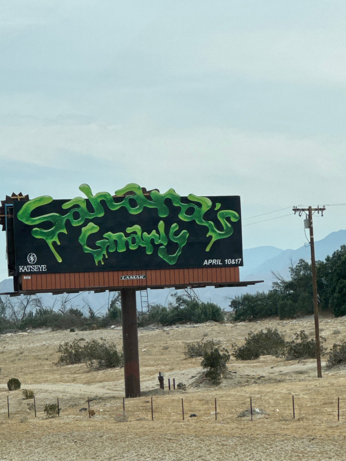 Katseye-sponsored billboard displays April dates in Cathedral City