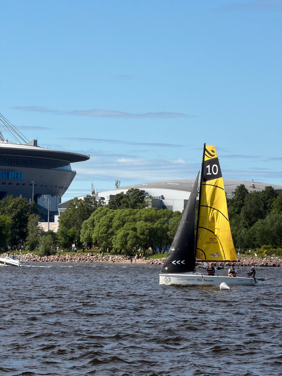 Sailing regatta on the Neva with Saint Petersburg landmarks as backdrop