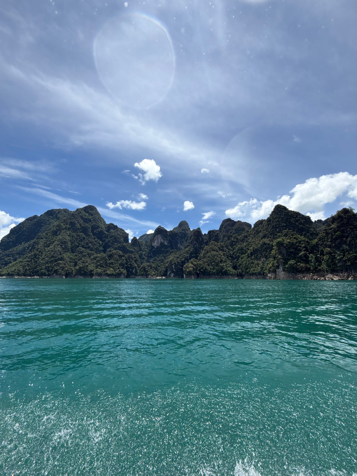 Turquoise lake and karst mountains at Khao Phang, Thailand