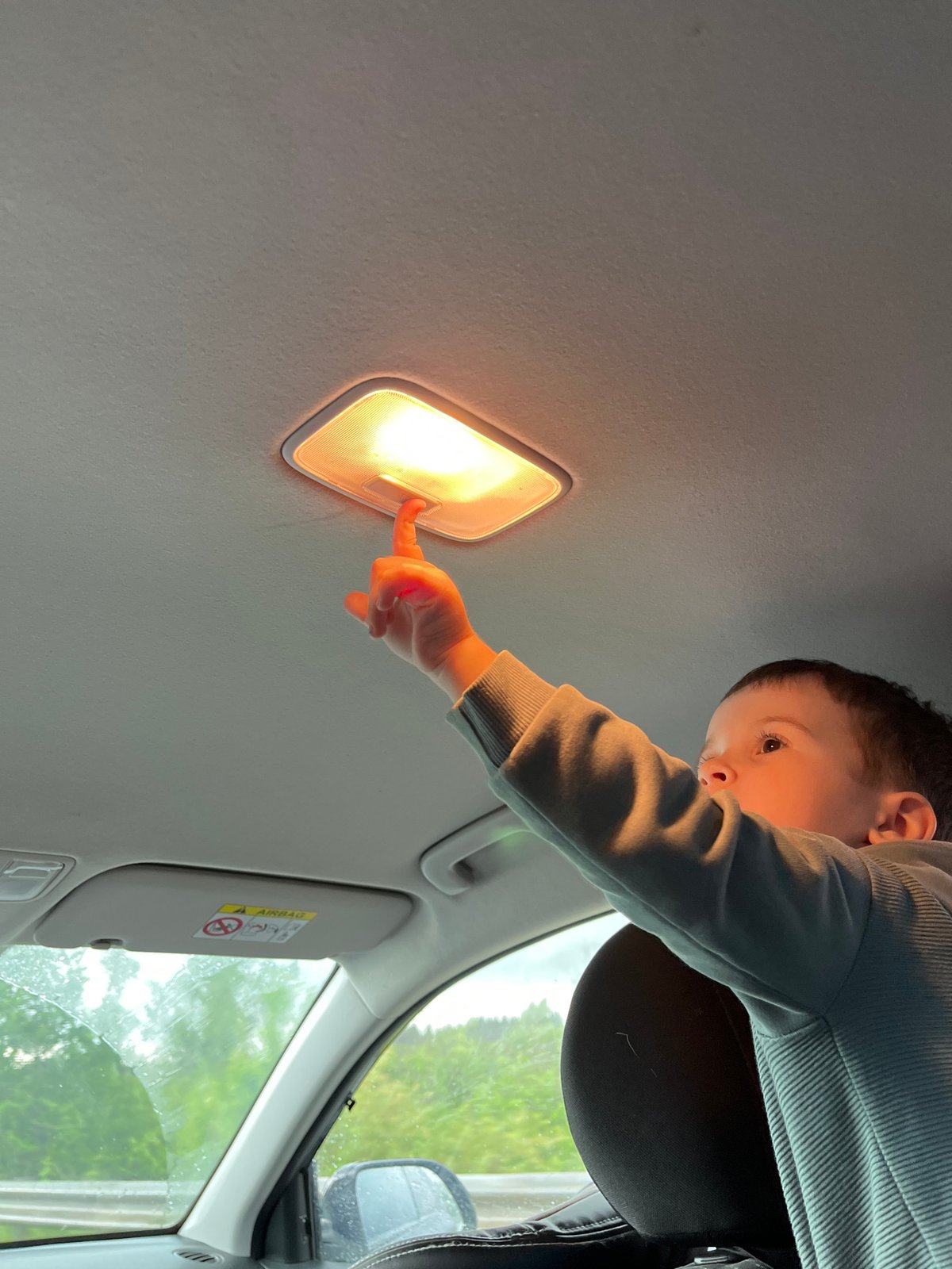 Child plays with car dome light in Votkinsk