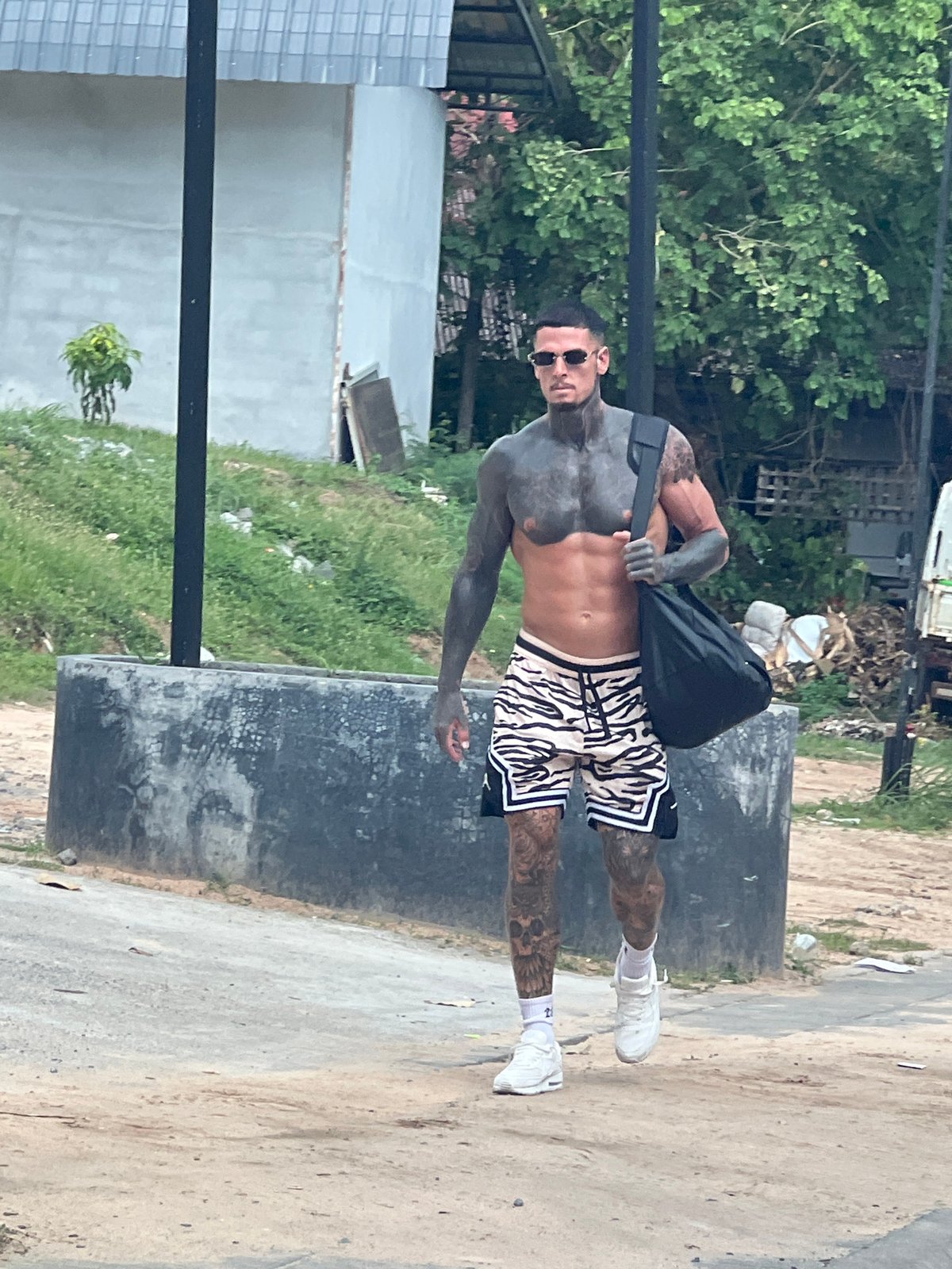 Morning street activity observed in Ban Bang Rak, Thailand