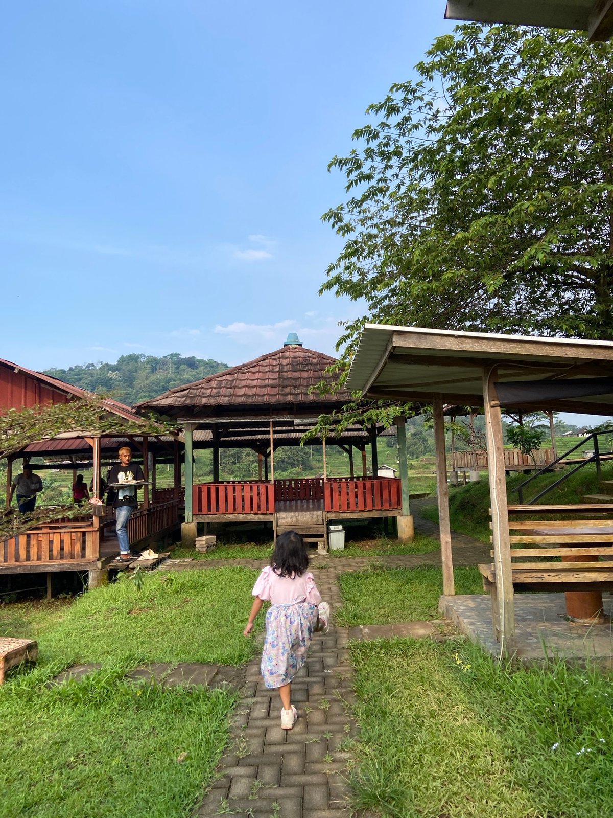 Mother and daughter enjoy weekend outing in rural Indonesia