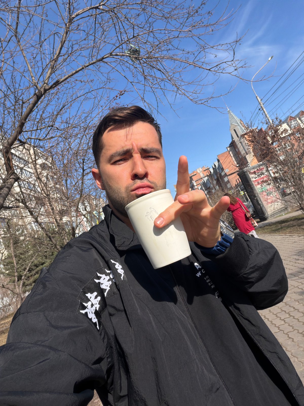 Man takes selfie with drink in Krasnoyarsk