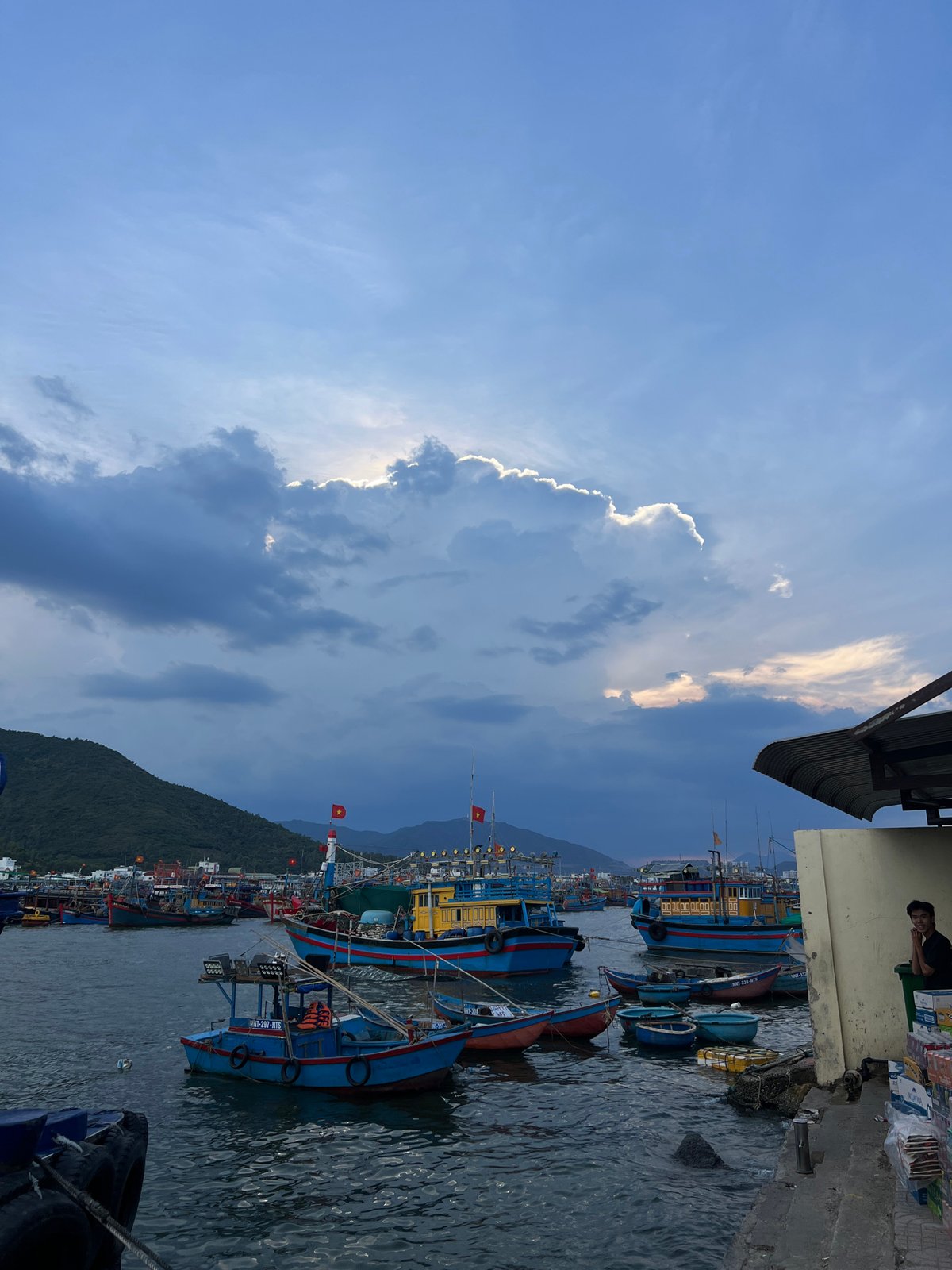 Fishing boats docked at pier in Nam Nha Trang Ward