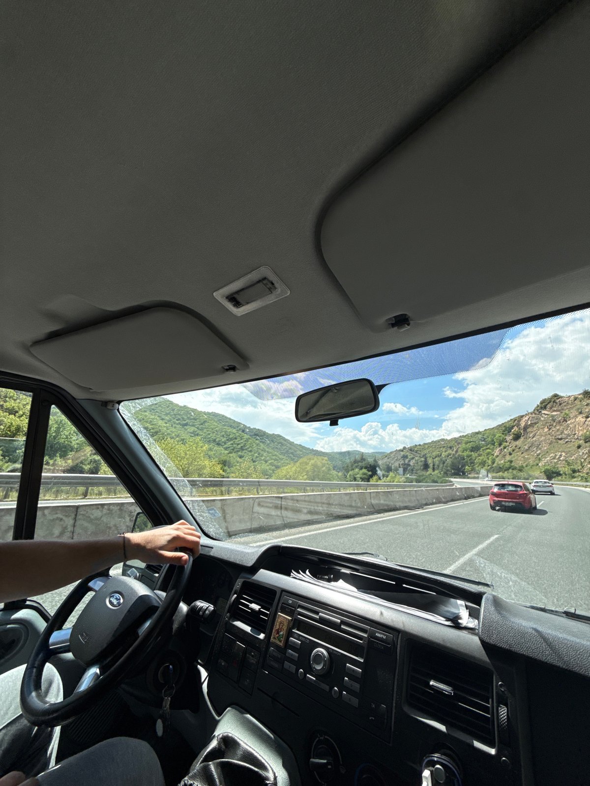 Vehicle interior documented during sunny drive through northern Greece