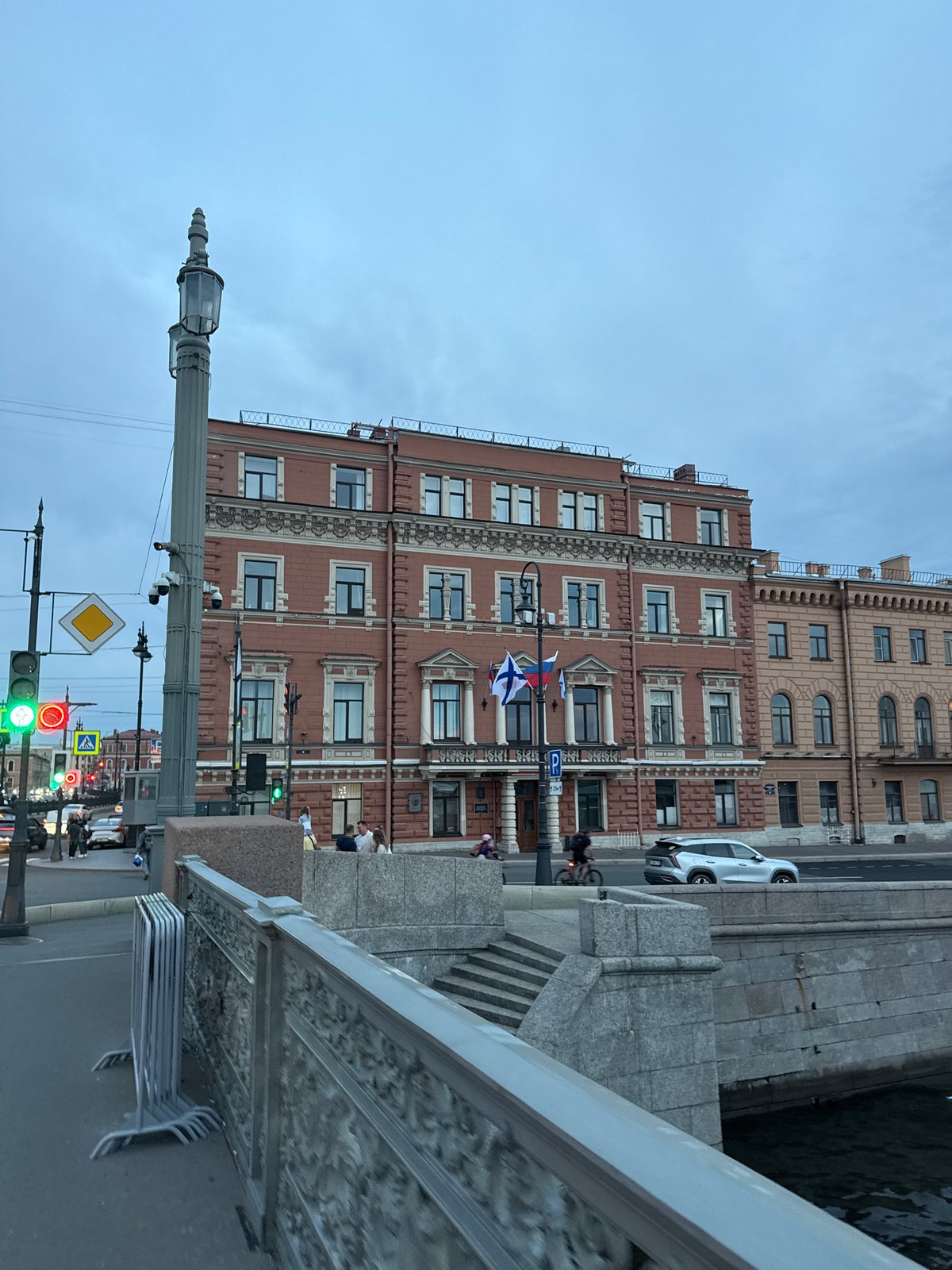 Saint Petersburg's historic streetscape at dusk, canals and all