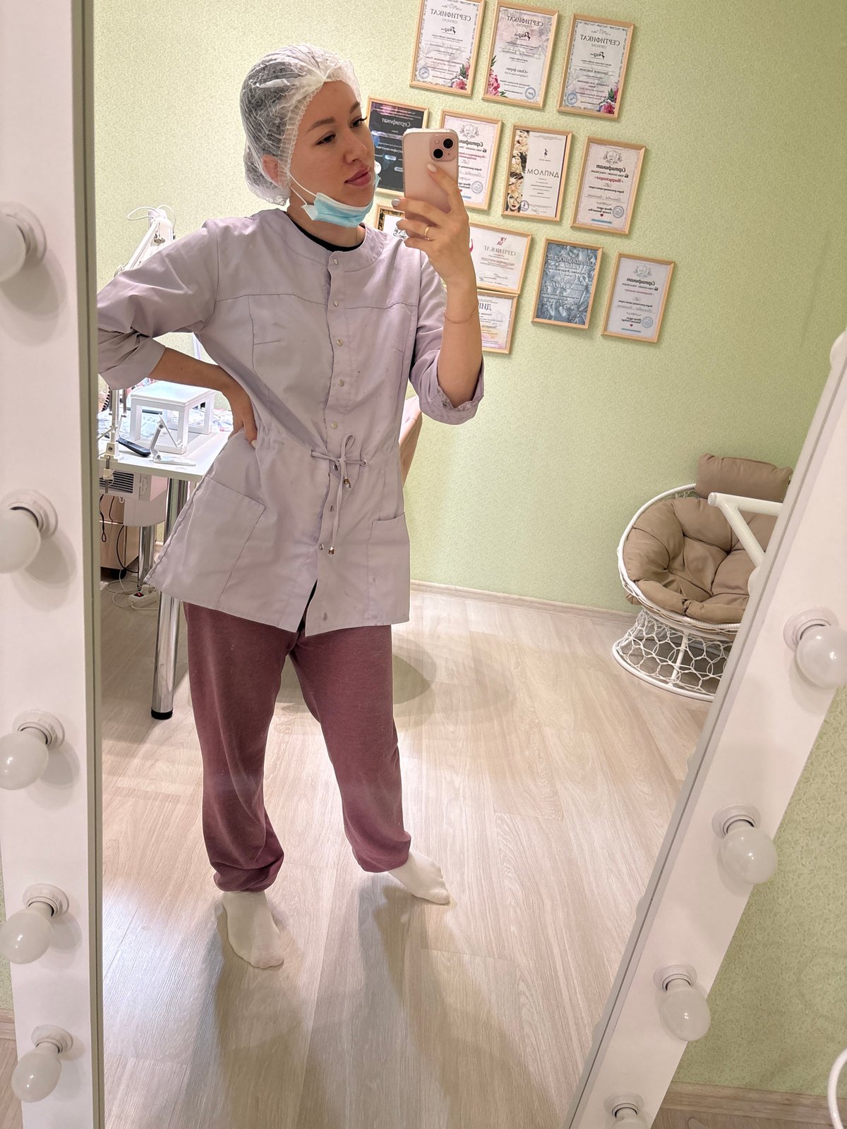Medical worker takes selfies while child plays in Kostoryata