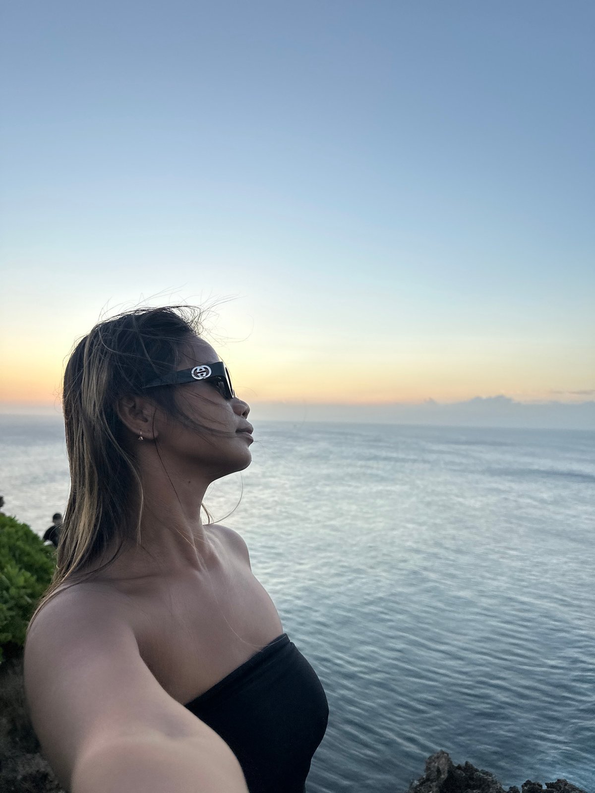 Sunset at Uluwatu cliffs, Bali — selfies, golden light, ocean views