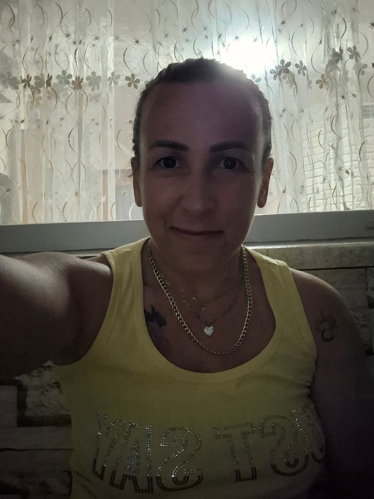 Late-night selfie series, yellow tank top and moonlit backdrop