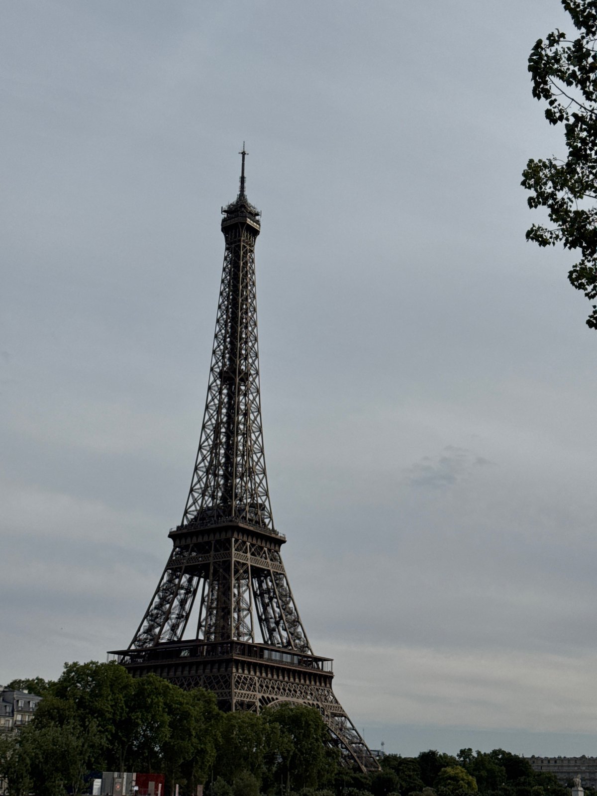 Eiffel Tower from below on a cloudy Paris afternoon