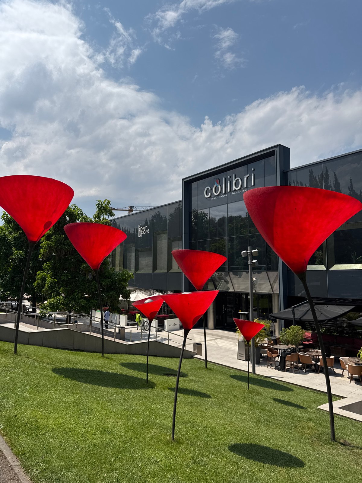 Colibri Mall's sculptural grounds on a sunny Almaty morning