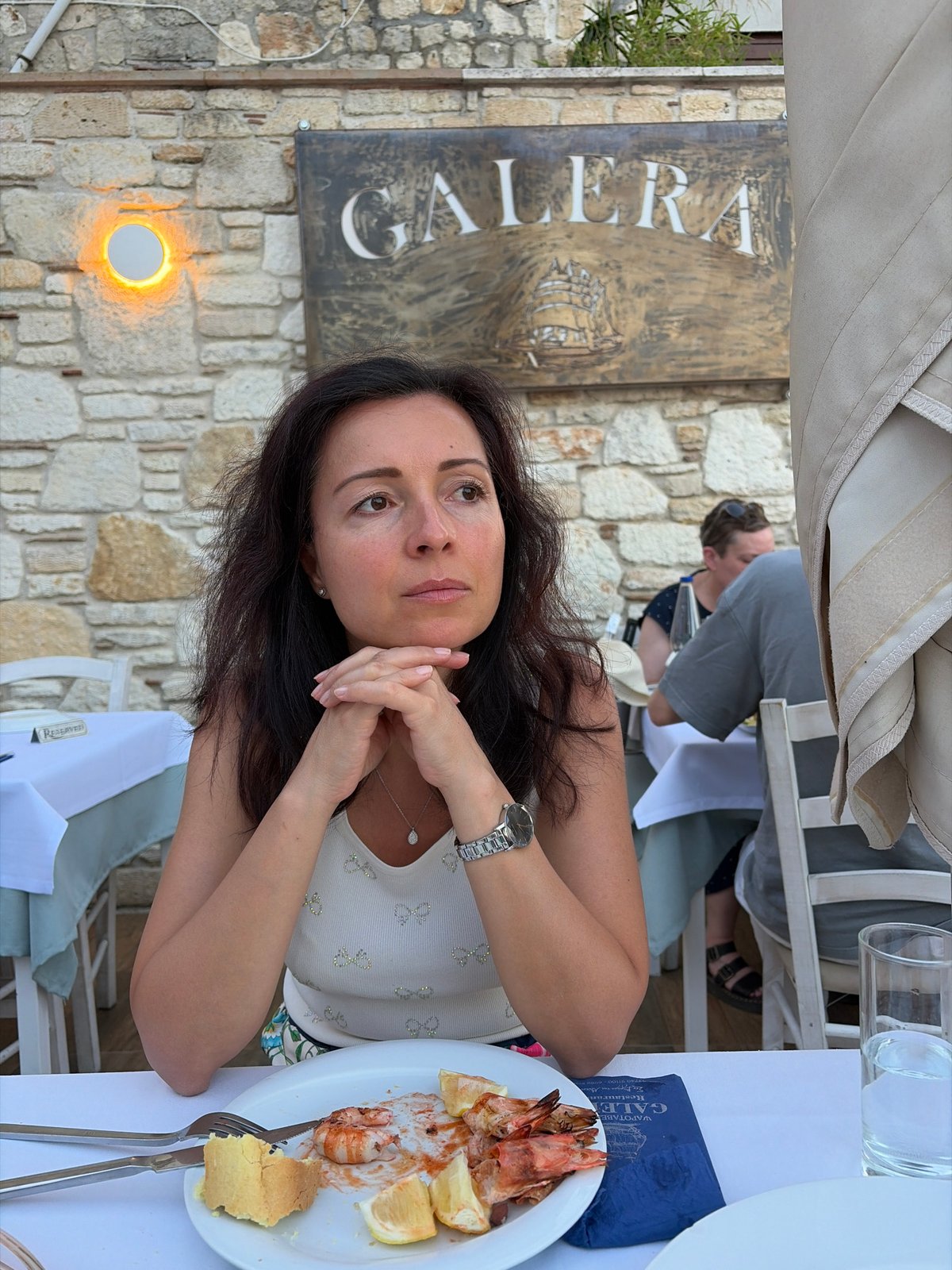 Dining out in Kassandra with a soccer match on in the background